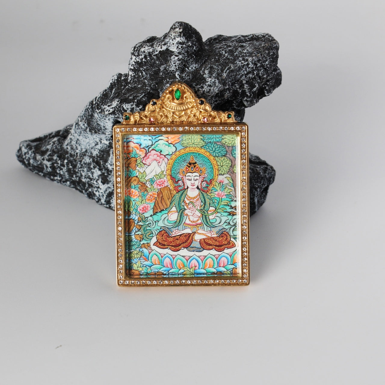  Close-up detail of the Nepal Premium Mahasthamaprapta Thangka painting showing intricate natural mineral pigment work, showcasing the masterful artistry of Nepali lineage painters.

