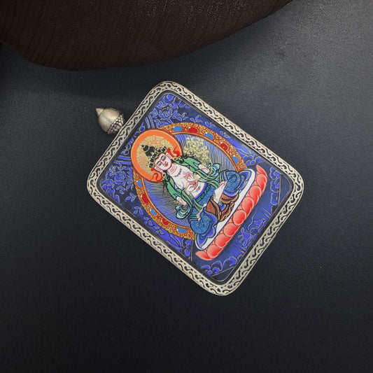  A 3.5x4.5cm hand-painted Rekong Blue Thangka Mahasthamaprapta (大势至菩萨) Thangka pendant with 925 silver featuring the Bodhisattva of Great Might, representing wisdom and success in Buddhist tradition.
