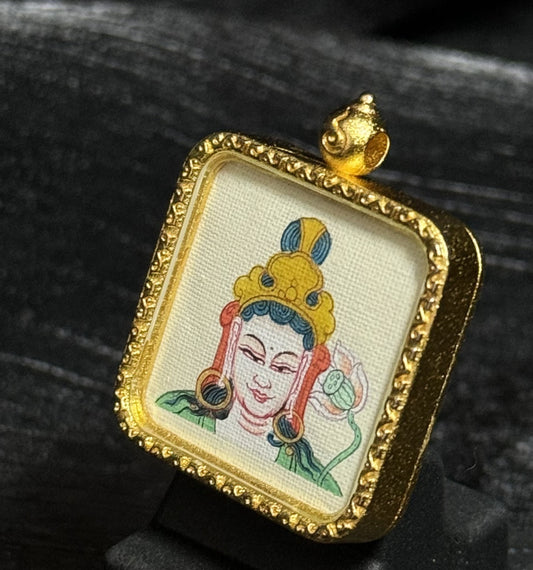  A 2x2cm hand-painted Tibet Mahasthamaprapta (Bodhisattva of Great Power) Thangka pendant featuring the symbol of light and wisdom, representing success and peace in Buddhist tradition.
