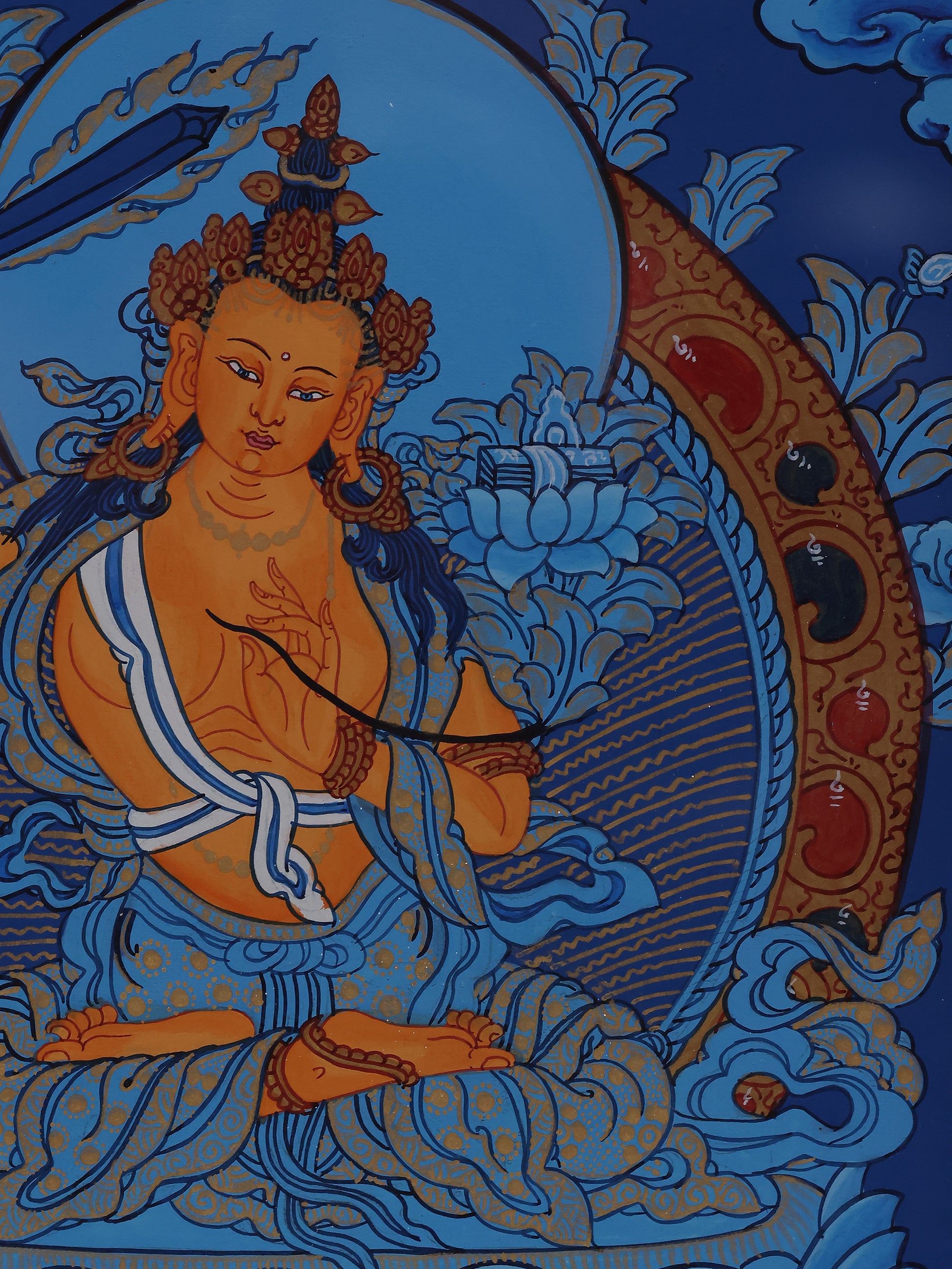 Finely detailed hand-painted blue thangka of Manjushri Bodhisattva in classical Tibetan style.