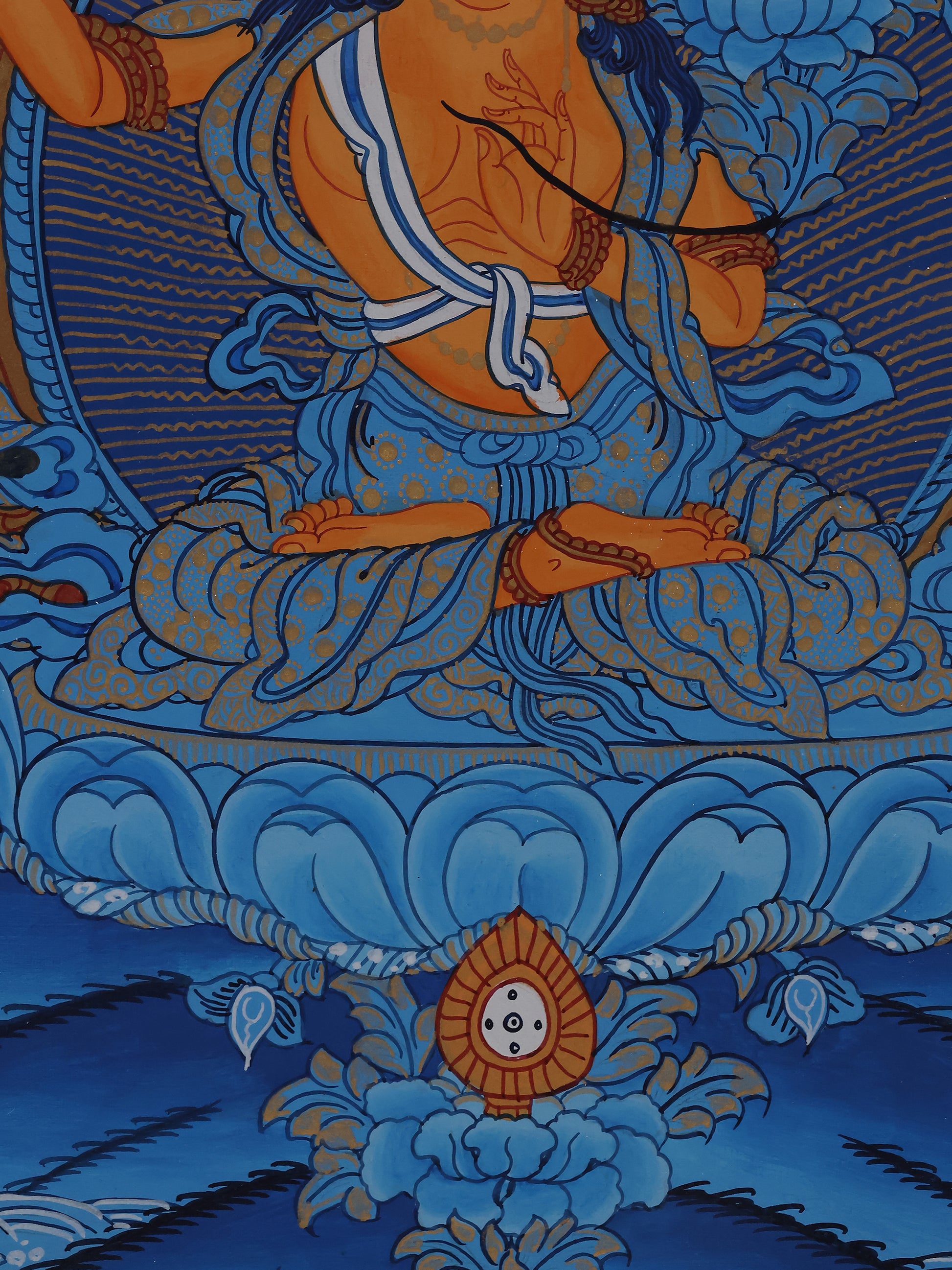 Blue thangka artwork showing Manjushri with the sword of prajna and the book of wisdom.