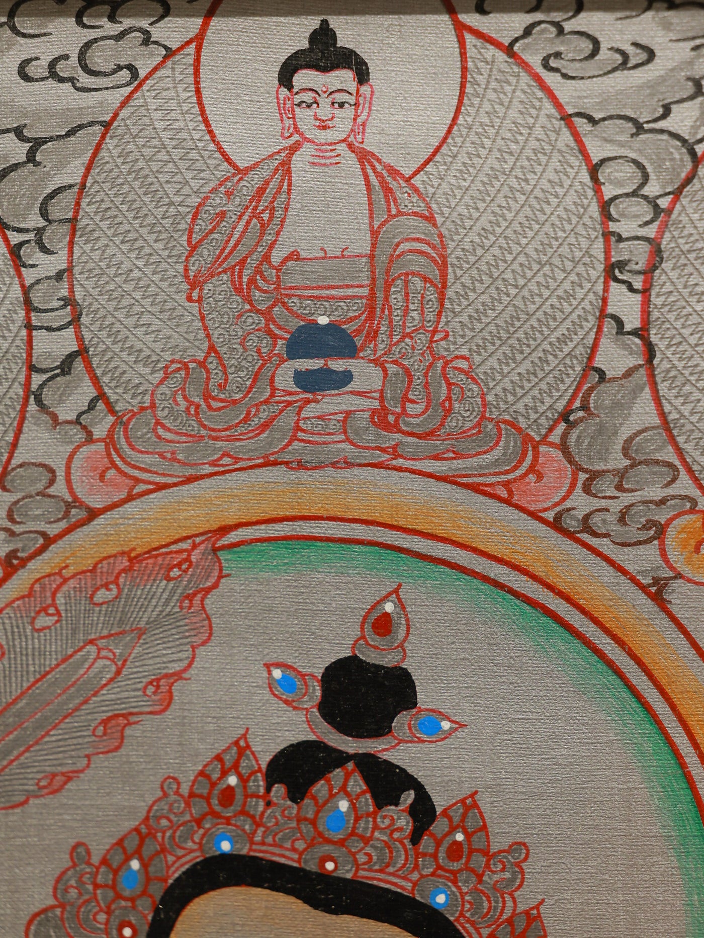 Tibetan Buddhist silver Manjushri thangka symbolizing transcendent wisdom and enlightenment