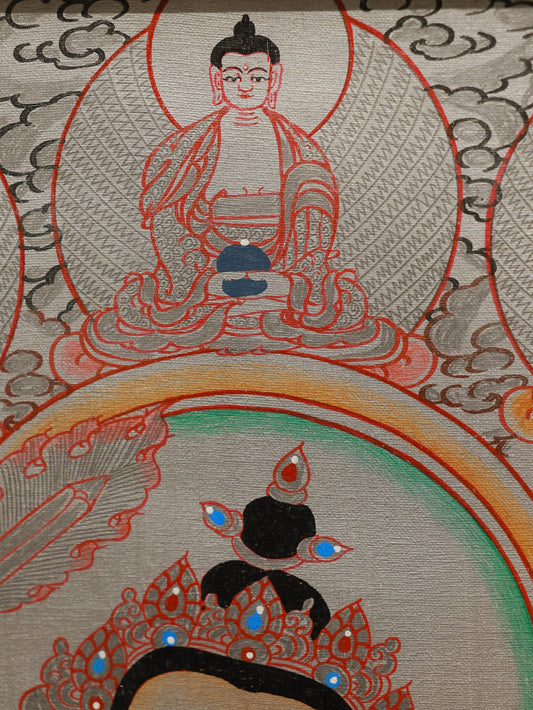 Tibetan Buddhist silver Manjushri thangka symbolizing transcendent wisdom and enlightenment