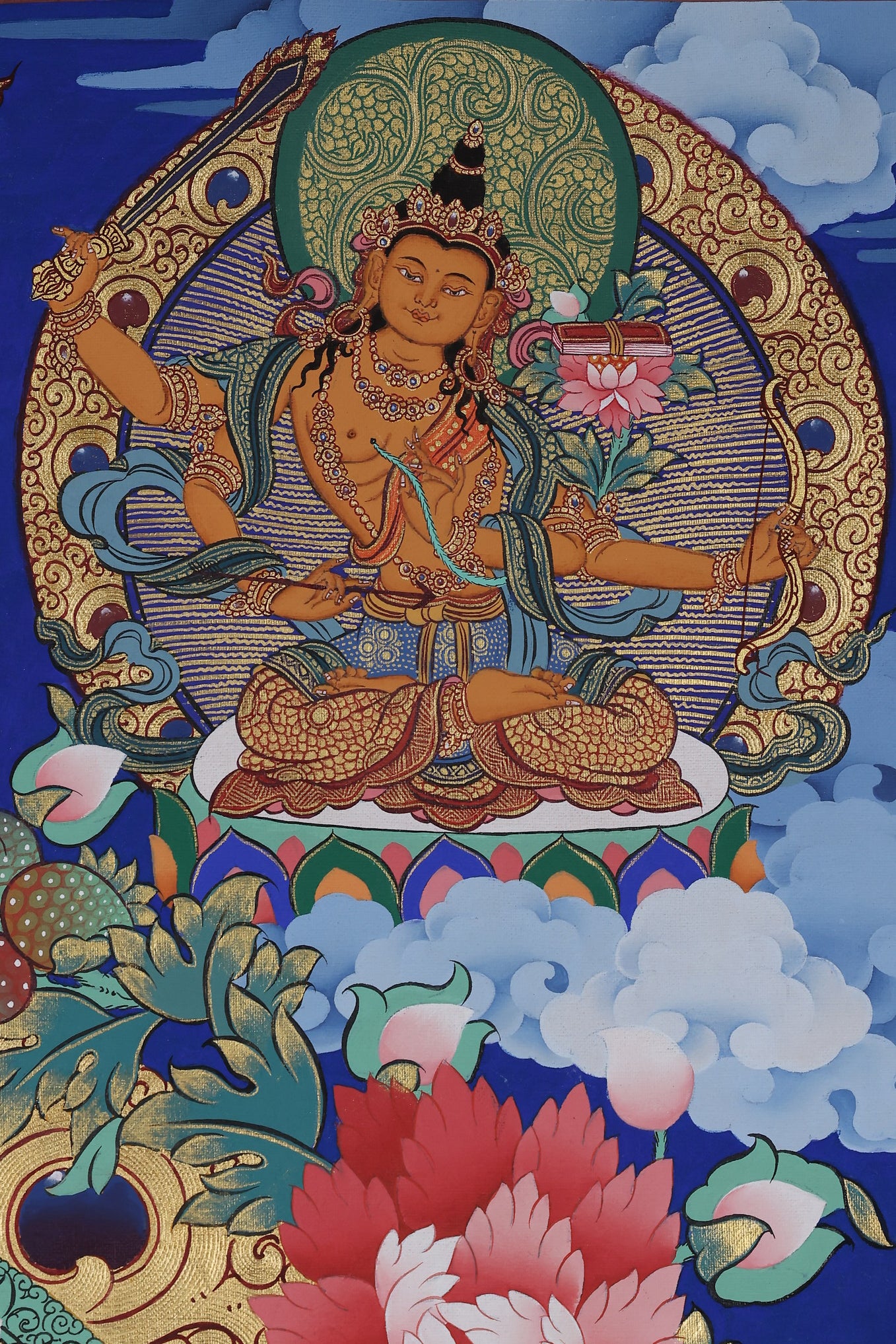 Alt Text: Sacred Tibetan Thangka of Manjushri, the embodiment of transcendent wisdom and enlightened insight.