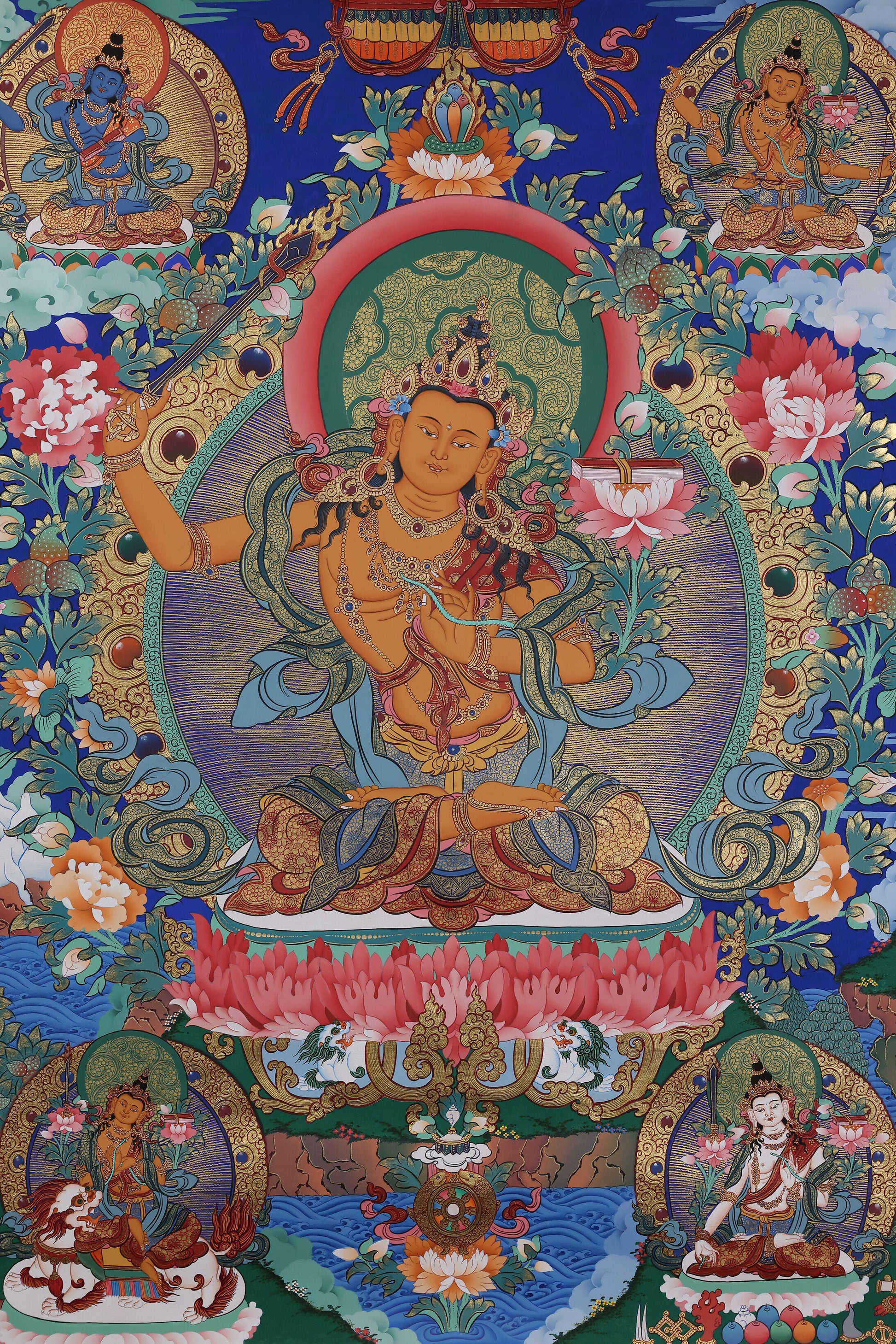 Alt Text: Hand-painted Manjushri Tibetan Thangka depicting the Bodhisattva of Wisdom holding the flaming sword and lotus.