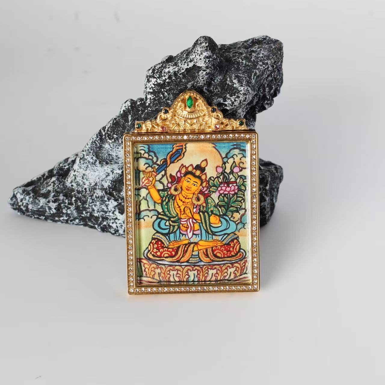  Close-up detail of the Nepal Elegant Manjushri Thangka painting showing intricate natural mineral pigment work, showcasing the masterful artistry of Nepali lineage painters