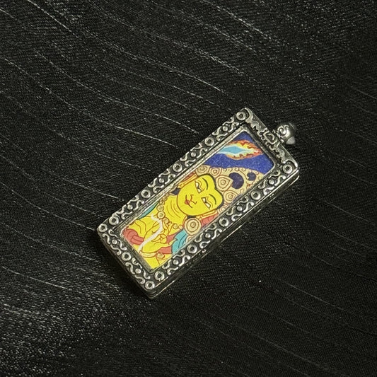  Hand-painted Rebgong Buddha Head Manjushri Thangka pendant featuring the Bodhisattva of Wisdom, encased in copper, representing wisdom and success in Tibetan Buddhist tradition.
