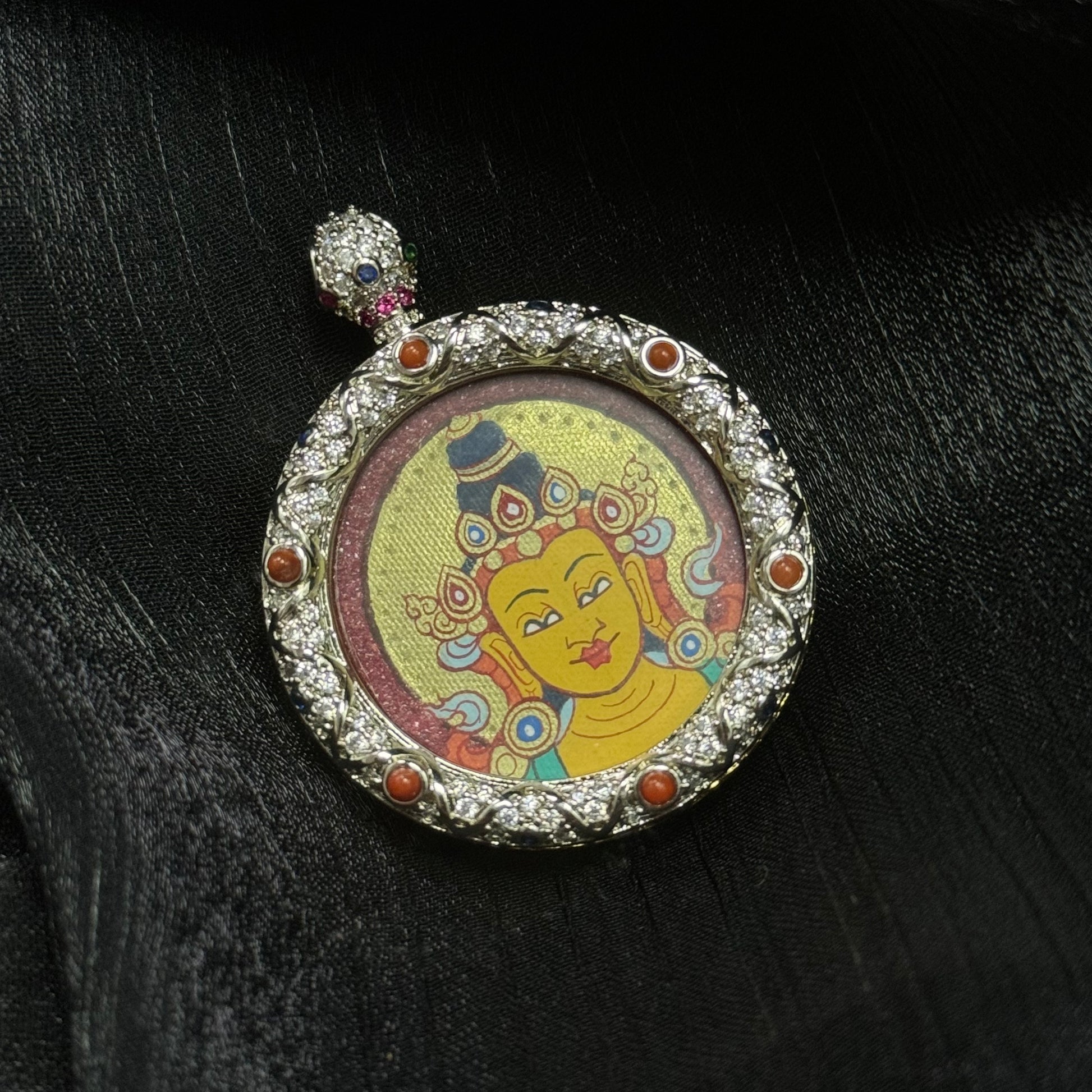  Close-up detail of the Rekong Red-Gold Manjushri Buddha Head Thangka painting showing mineral pigments and gold leaf, showcasing the masterful artistry of Rekong lineage painters.
