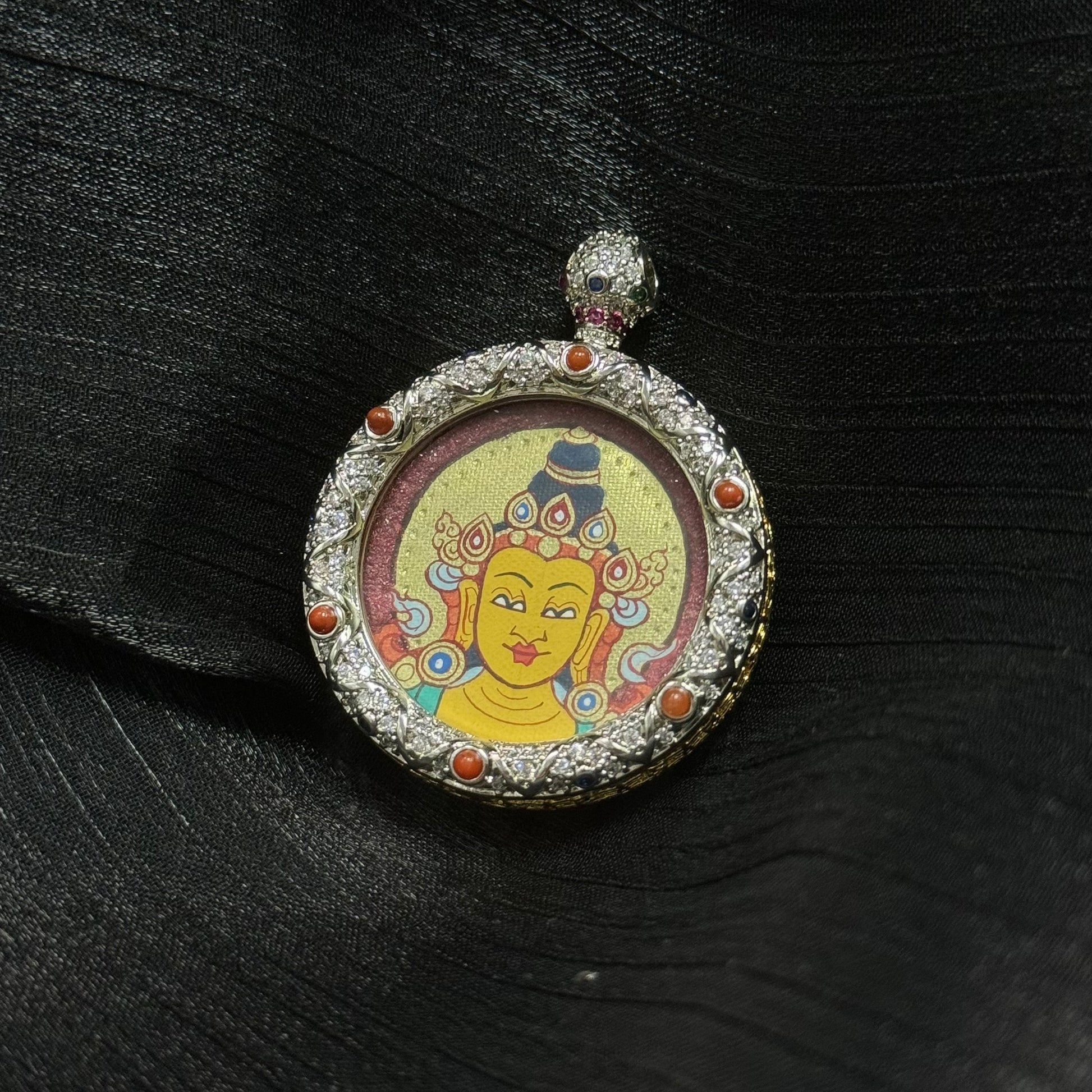 Detailed view of the jewellery copper casing for the Manjushri Buddha Head Thangka pendant, symbolising protection and tradition in Buddhist practice.
