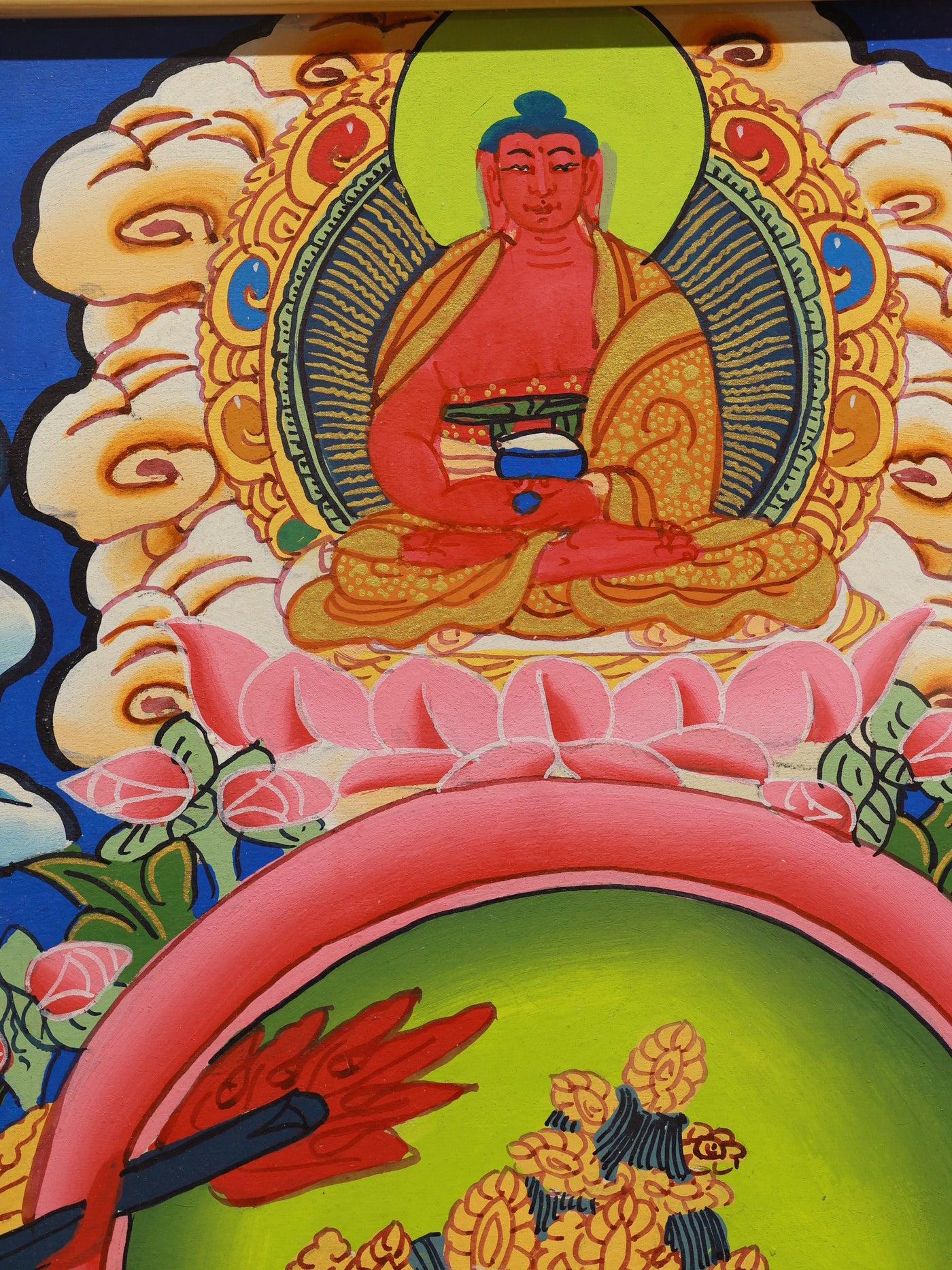 Thangka of Manjushri riding a lion mount, surrounded by five wisdom banners, symbolizing the power of wisdom to overcome ignorance.