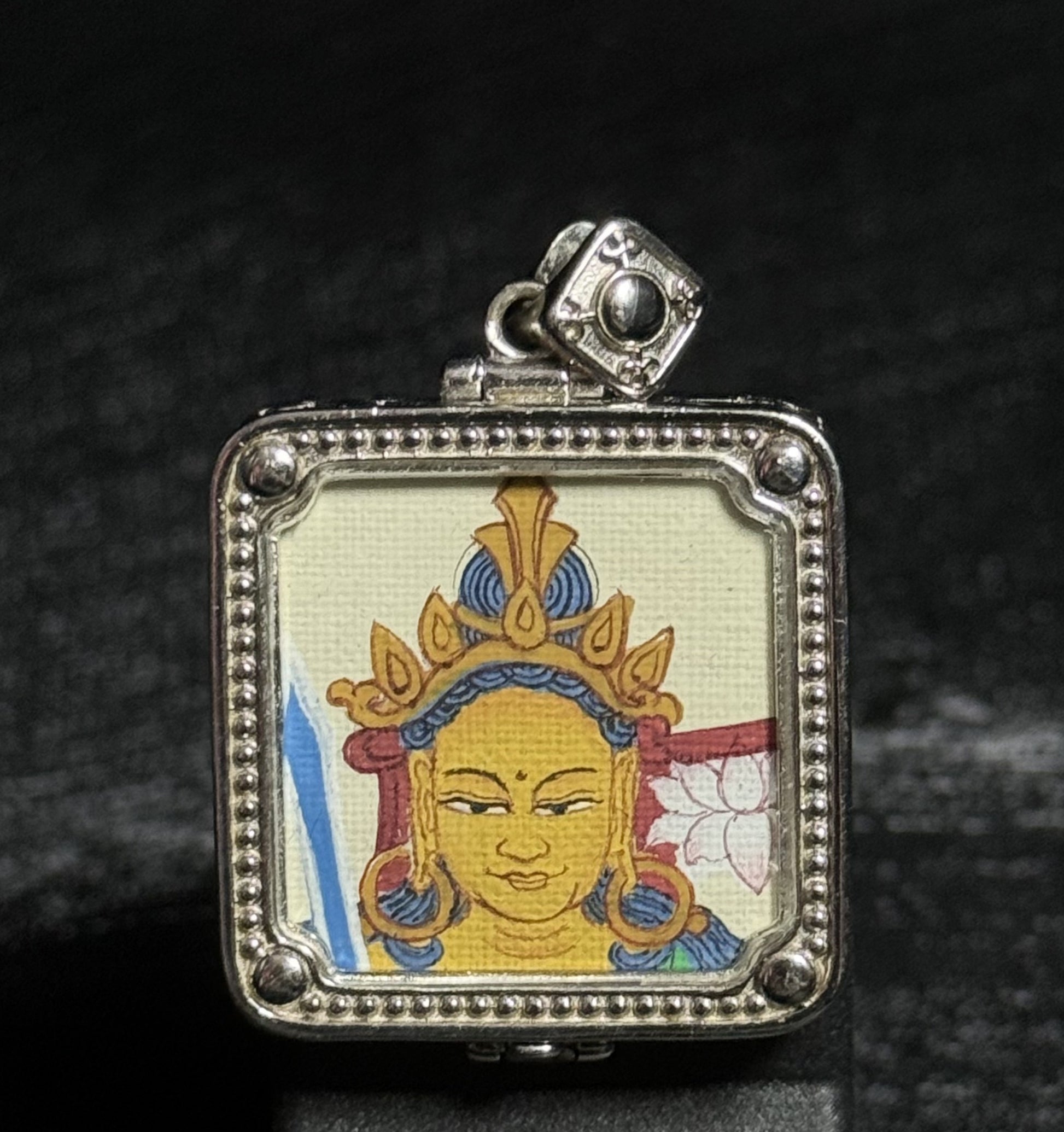  Close-up detail of the Tibet Manjushri Thangka painting showing natural mineral pigments, showcasing the masterful artistry of Tibetan lineage painters.