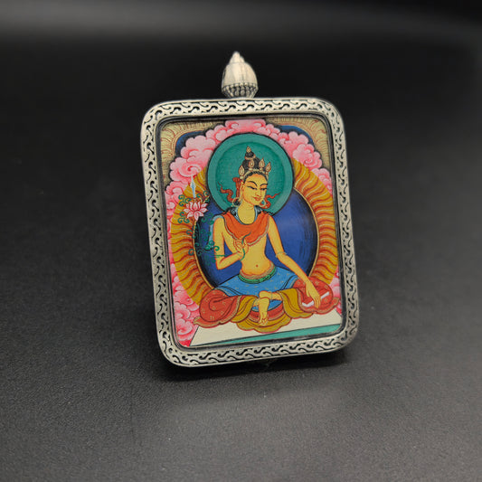 A 3.5x4.5cm hand-painted Tibet Red Cloud Manjushri (文殊菩萨) Thangka pendant with 925 silver featuring the Mother of all Buddhas and the wisdom deity, representing wisdom and blessing in Buddhist tradition.
