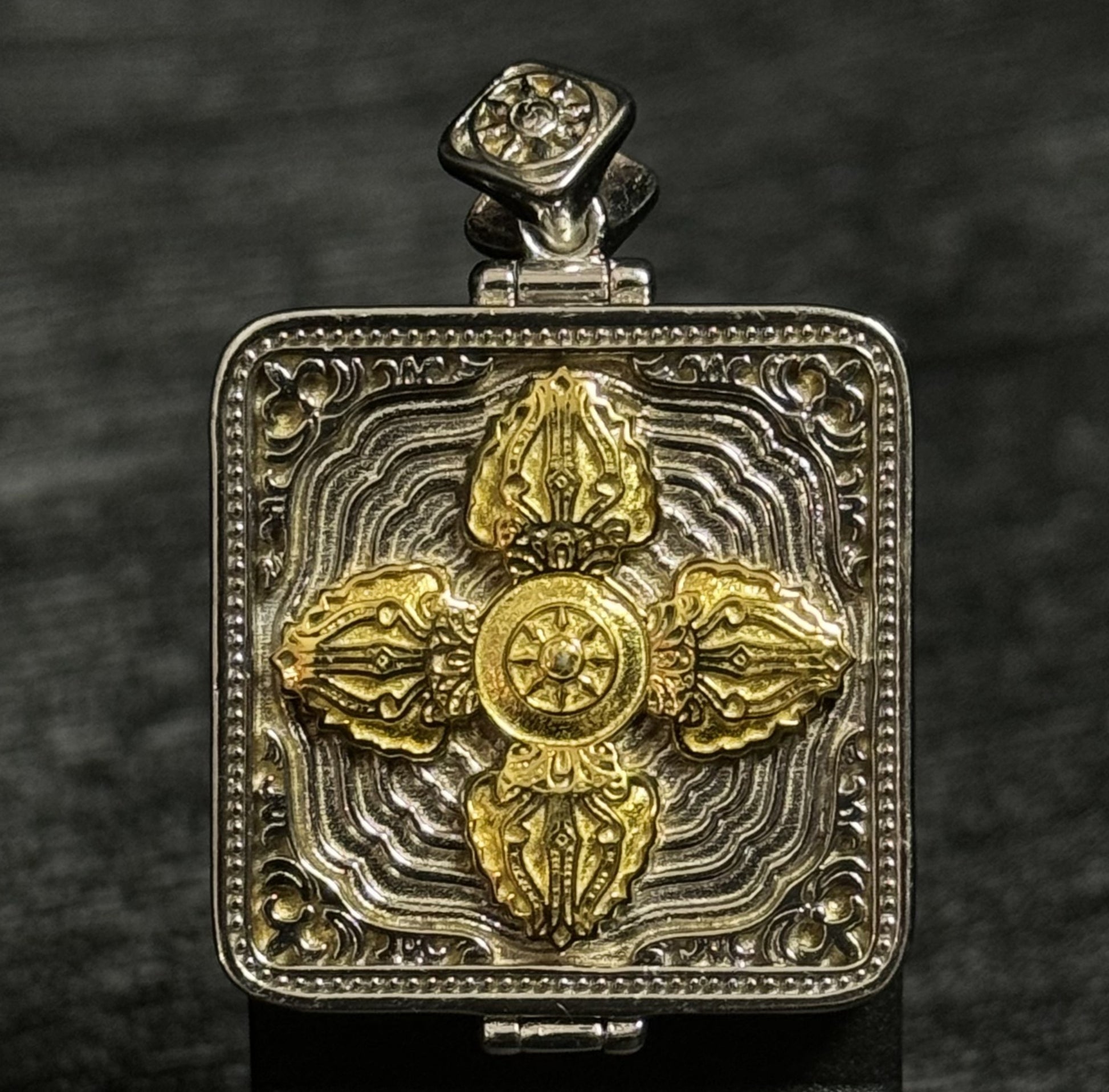  The Tibet Manjushri Thangka pendant displayed as a sacred amulet for wisdom and success, embodying Buddhist tradition.
