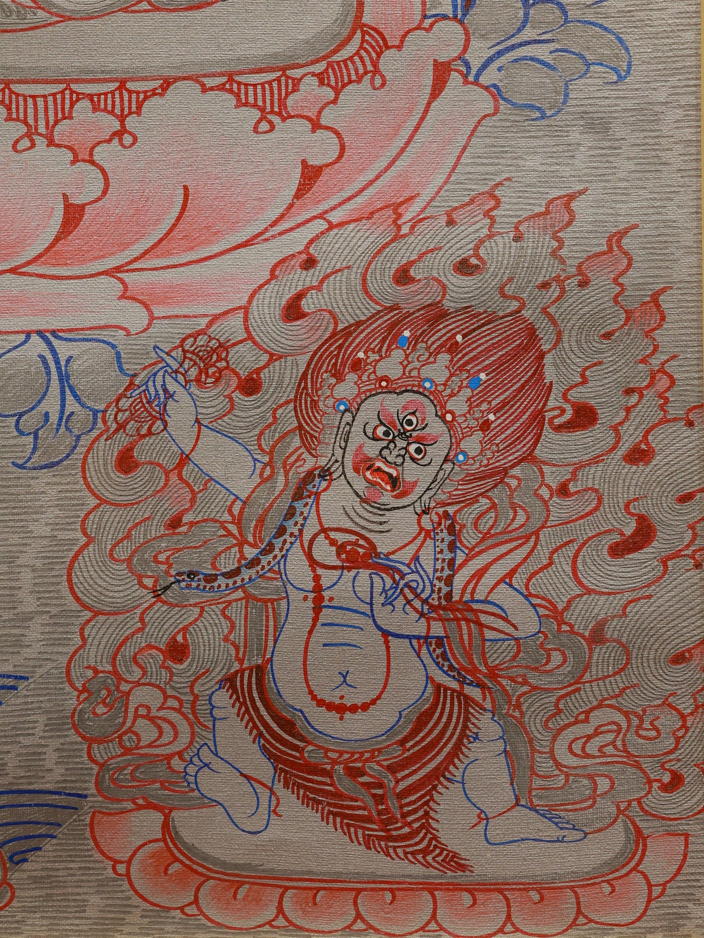 Traditional Tibetan silver thangka depicting Manjushri Bodhisattva seated in lotus posture