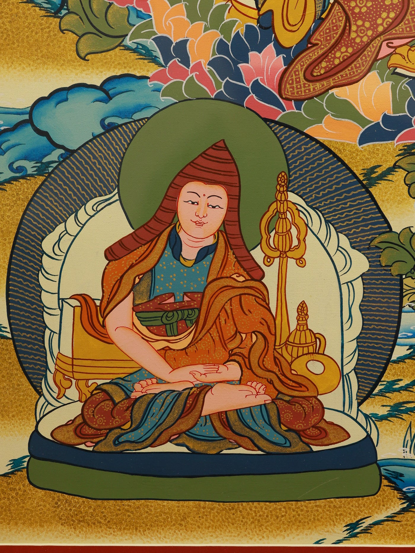 Ornate Tibetan Buddhist Thangka depicting Padmasambhava in vivid colors.