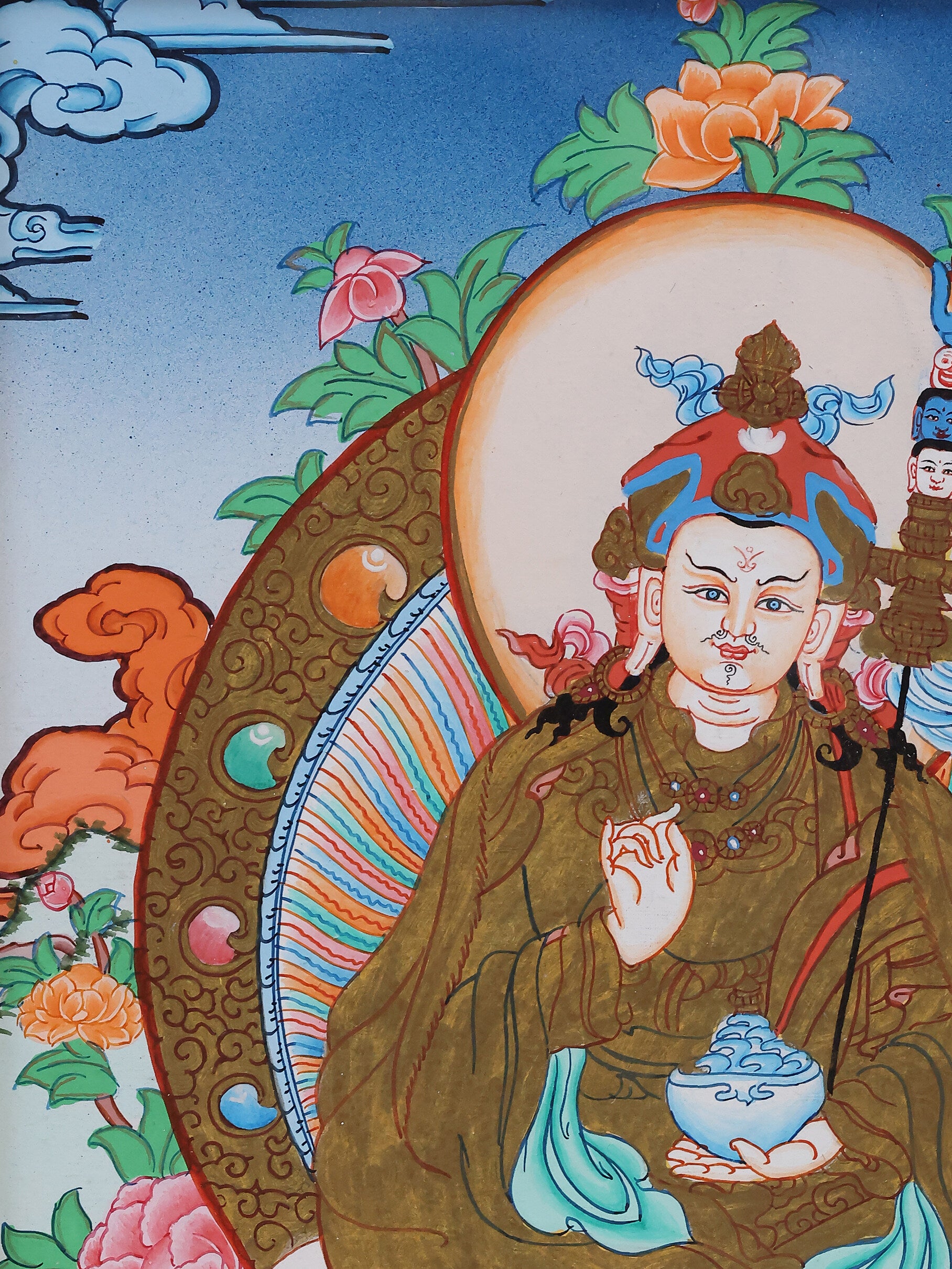 Colorful Padmasambhava thangka art from Tibetan Buddhist culture, Guru Rinpoche seated on lotus throne