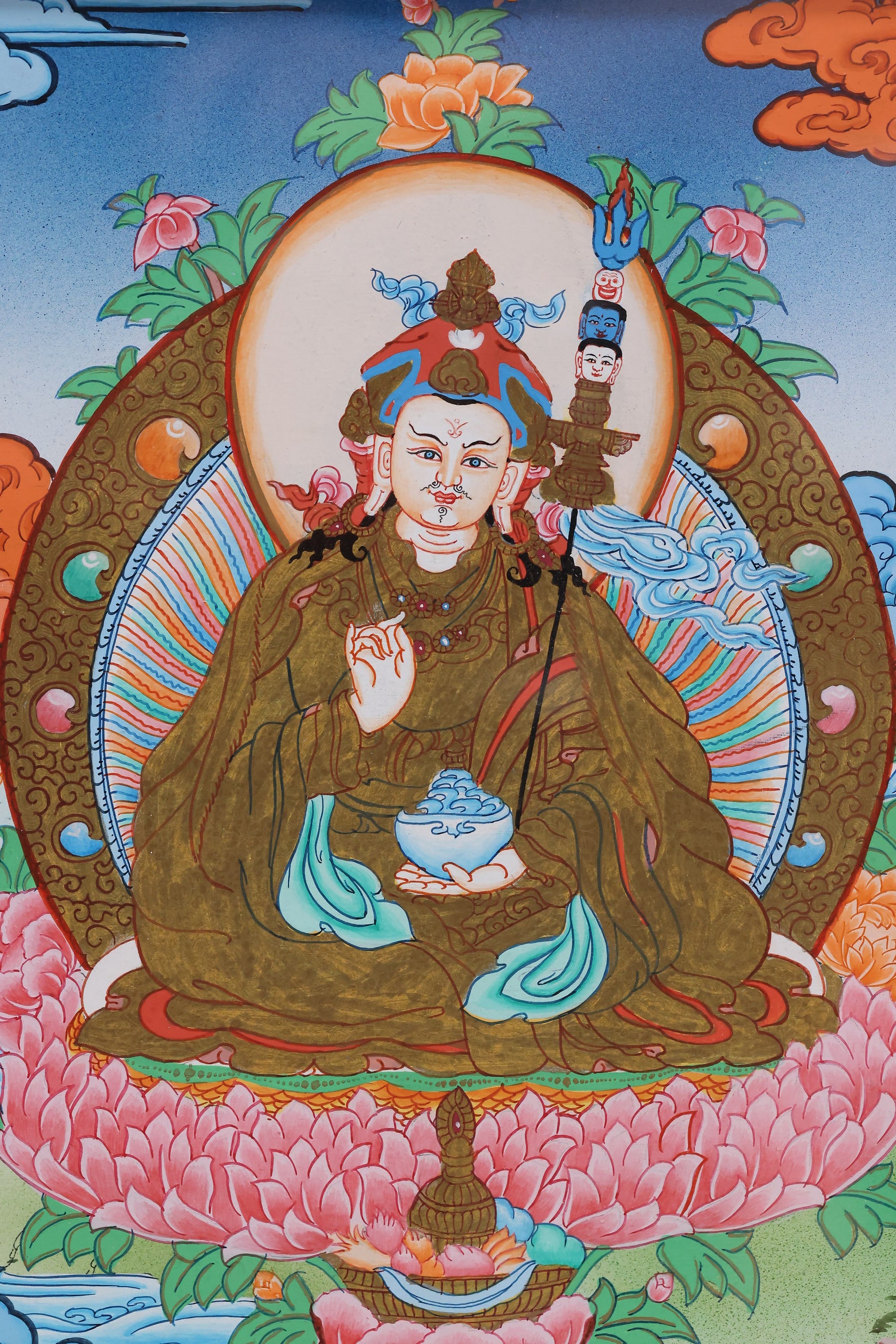 Colored Padmasambhava Thangka painting in Tibetan Buddhist culture, Guru Rinpoche depicted in traditional sacred art