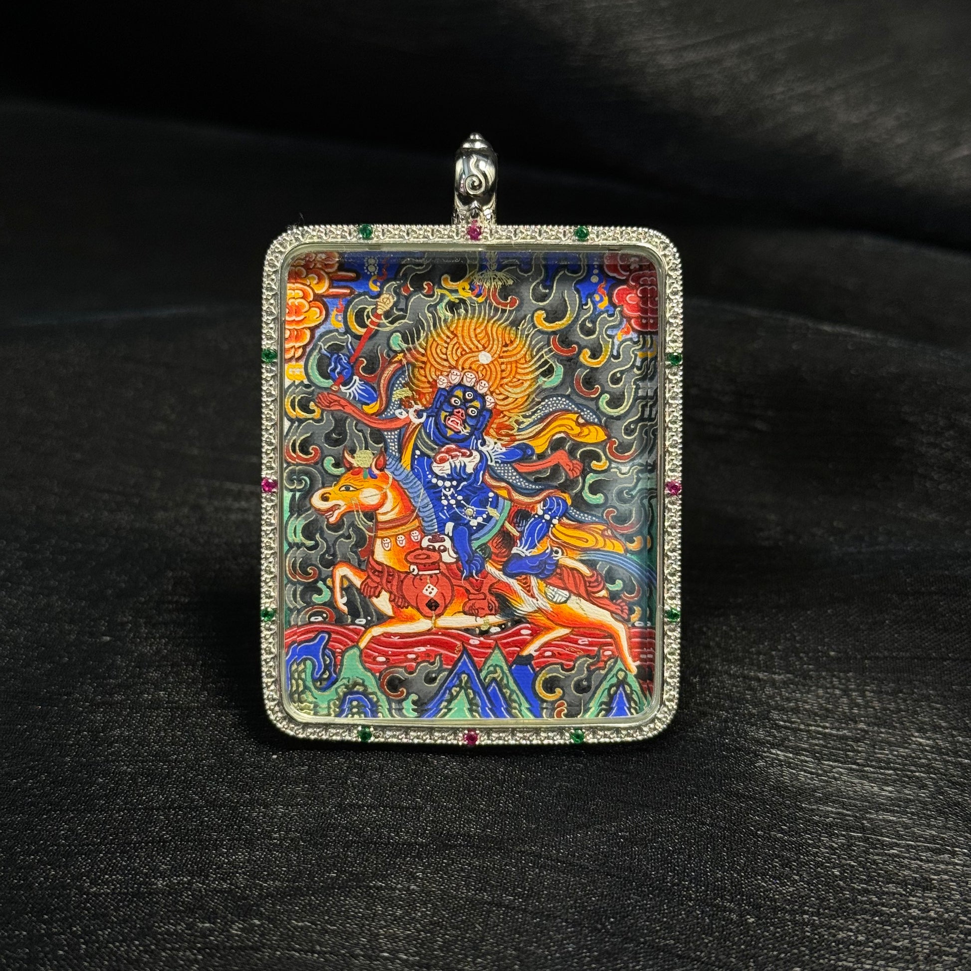  Detailed view of the casing and presentation for the Palden Lhamo Thangka pendant, symbolising tradition and collectibility.

