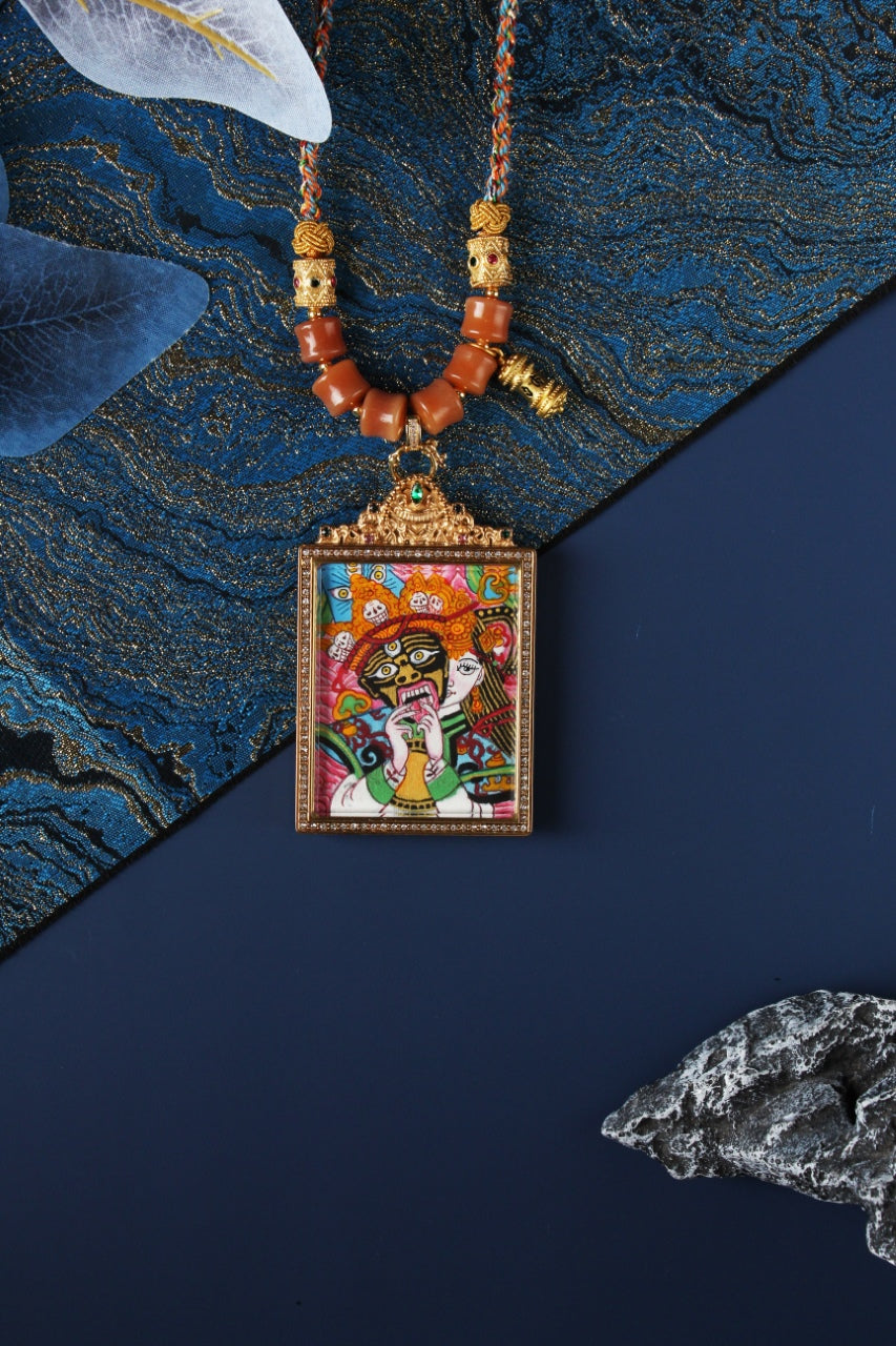 Detailed view of the exclusive 925 Sterling Silver casing for the Palden Lhamo Thangka pendant, symbolizing protection and elegance in Tibetan Buddhist tradition.

