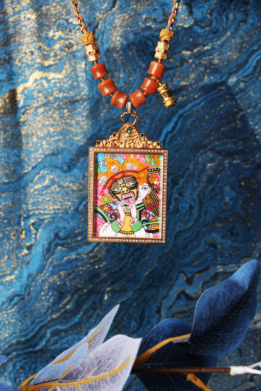 The Tibetan Buddhist Palden Lhamo Thangka pendant displayed as a sacred protective amulet for wealth, protection, and spiritual practice, embodying the fierce wisdom and compassionate protection of Tibetan Buddhist tradition.
