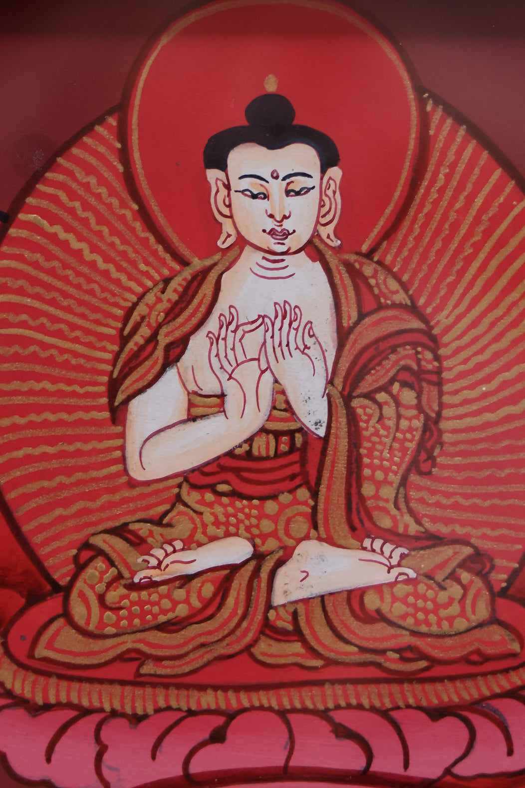 Red Shakyamuni Buddha with Western Trinity attendants, illustrating Tibetan Pure Land iconography.