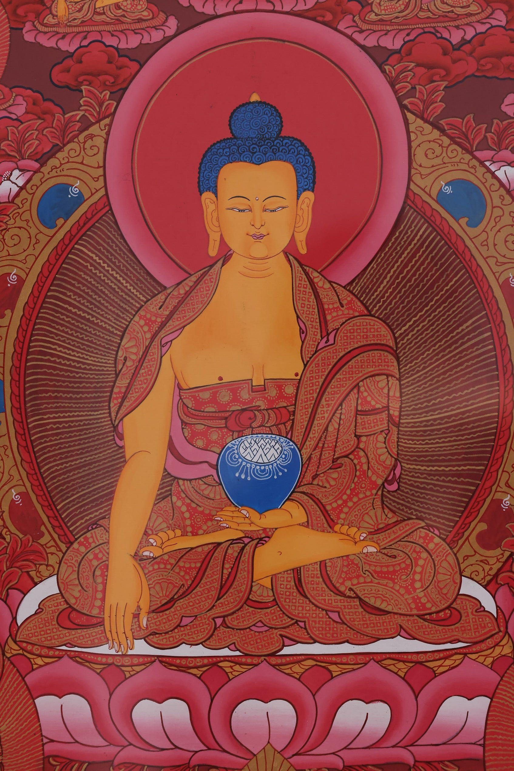 Red Shakyamuni Buddha above a sacred lotus pond, symbolizing purity and liberation.