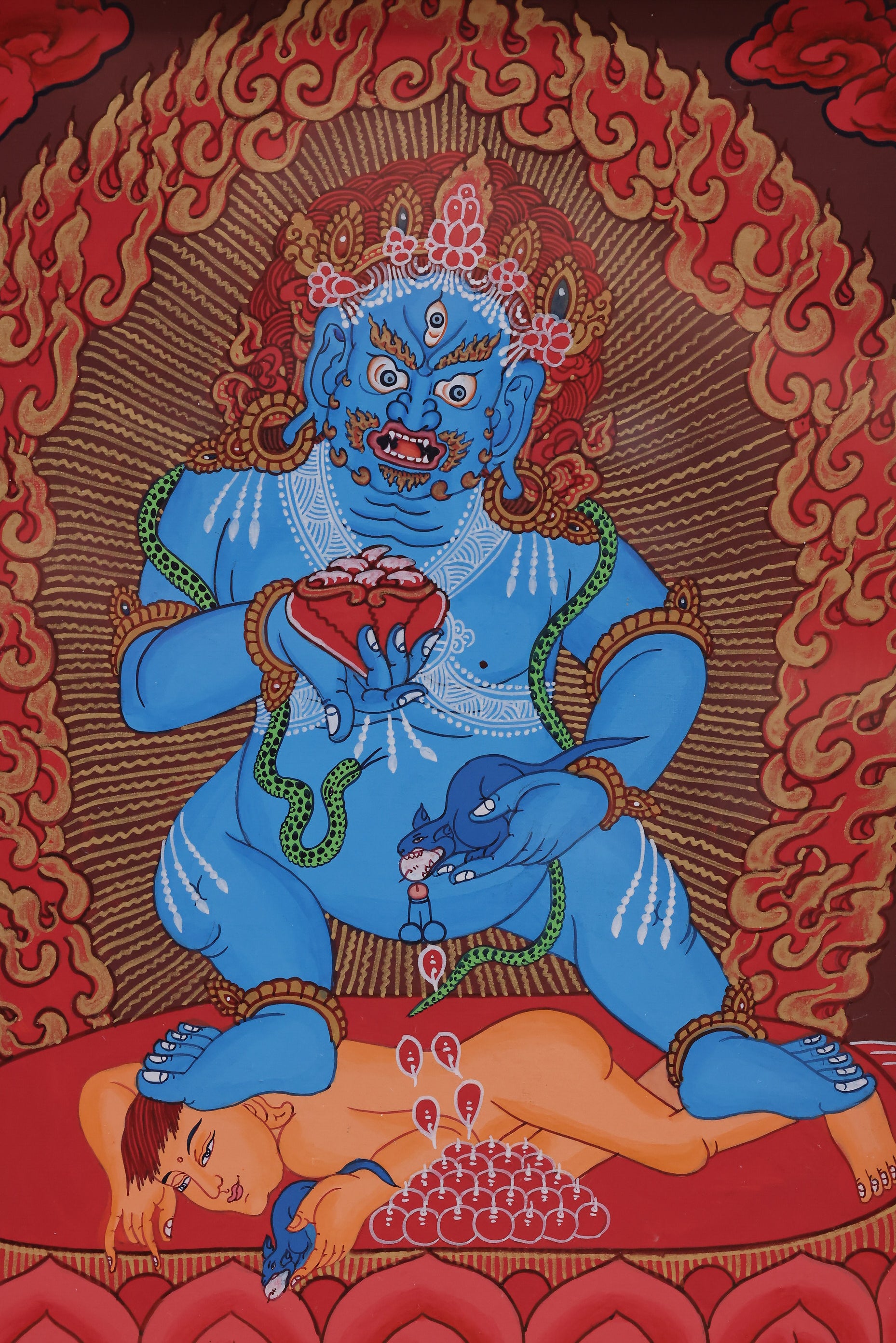 Red thangka of Black Jambhala as a wealth protection deity, symbolizing generosity, power, and spiritual abundance