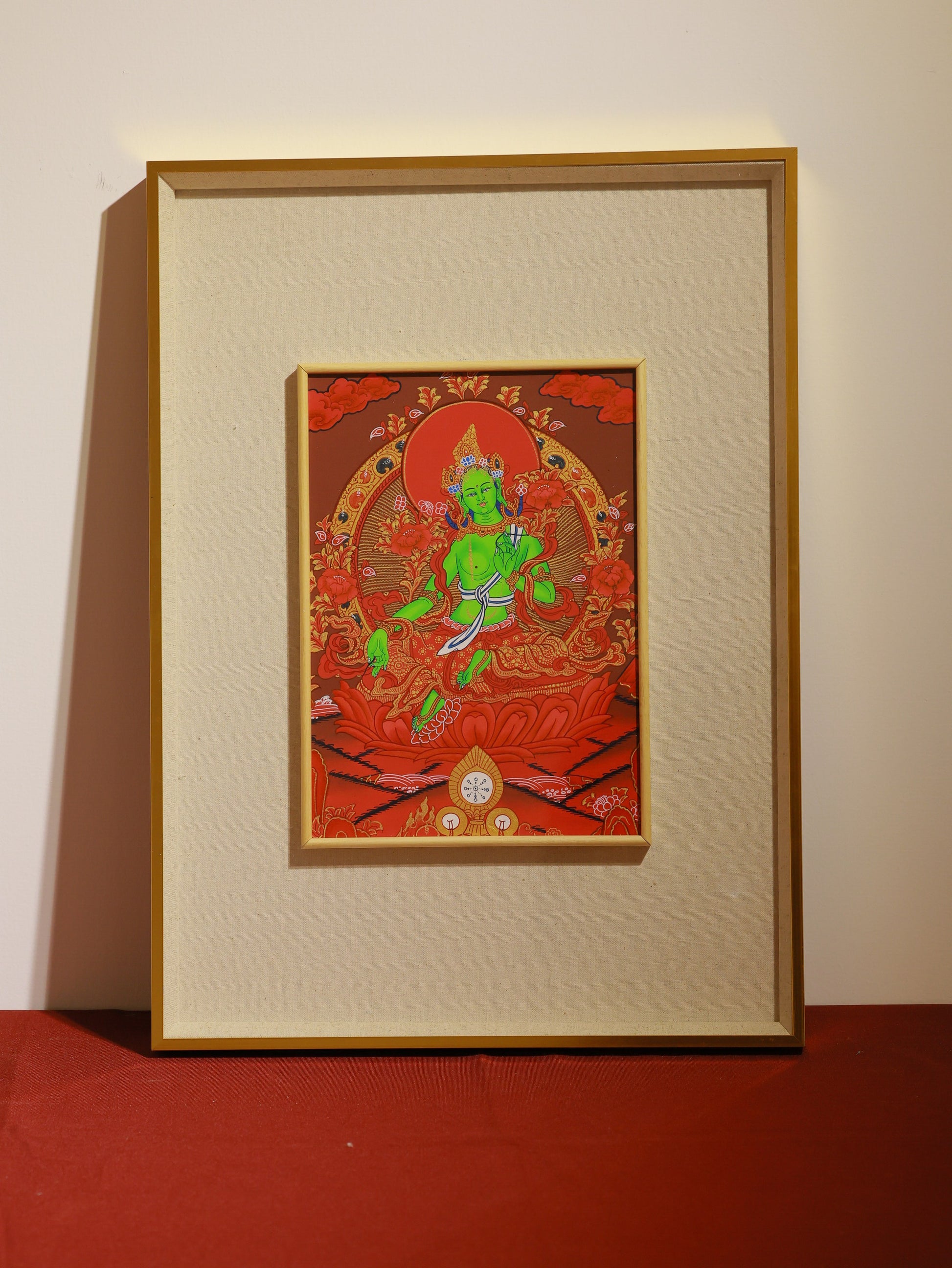 Red Thangka Green Tara Buddhist art illustrating fearless protection and blessings in Tibetan tradition