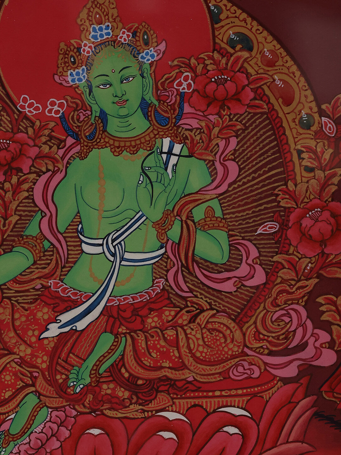 tibetan-buddhist-culture-red-thangka-green-tara-compassion-peace.jpg
Alt Text: “Green Tara in Red Thangka, symbolizing compassion and peace, Tibetan Buddhist sacred art.”