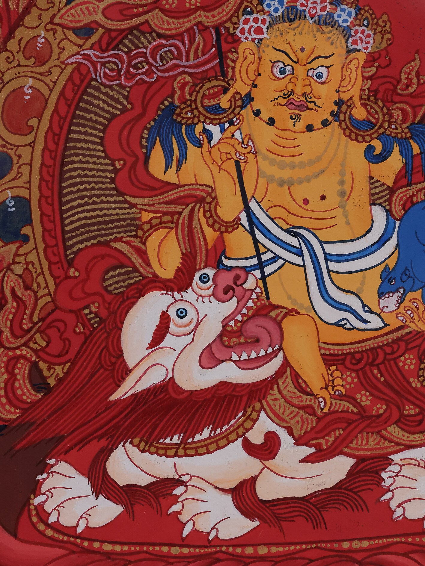 Alt: Detailed hand-painted red Thangka of the Treasure King, Tibetan Buddhist sacred art.