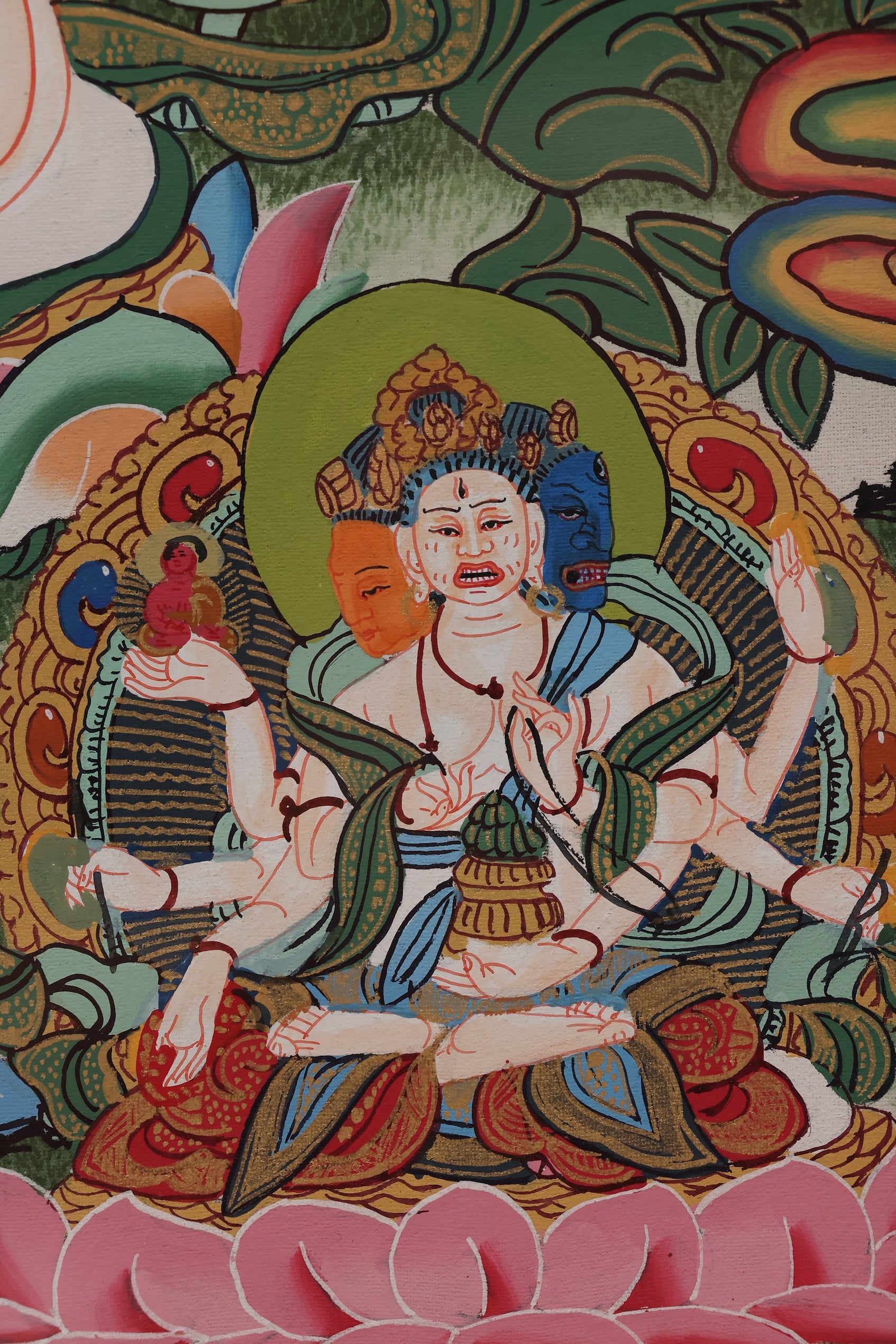 Samantabhadra Bodhisattva Thangka with accompanying Buddhas, representing protection and Dharma transmission.