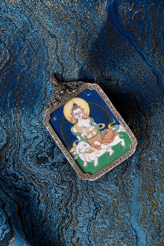 Samantabhadra Bodhisattva thangka pendant depicting the bodhisattva of universal practice and vows in Tibetan Buddhist culture.