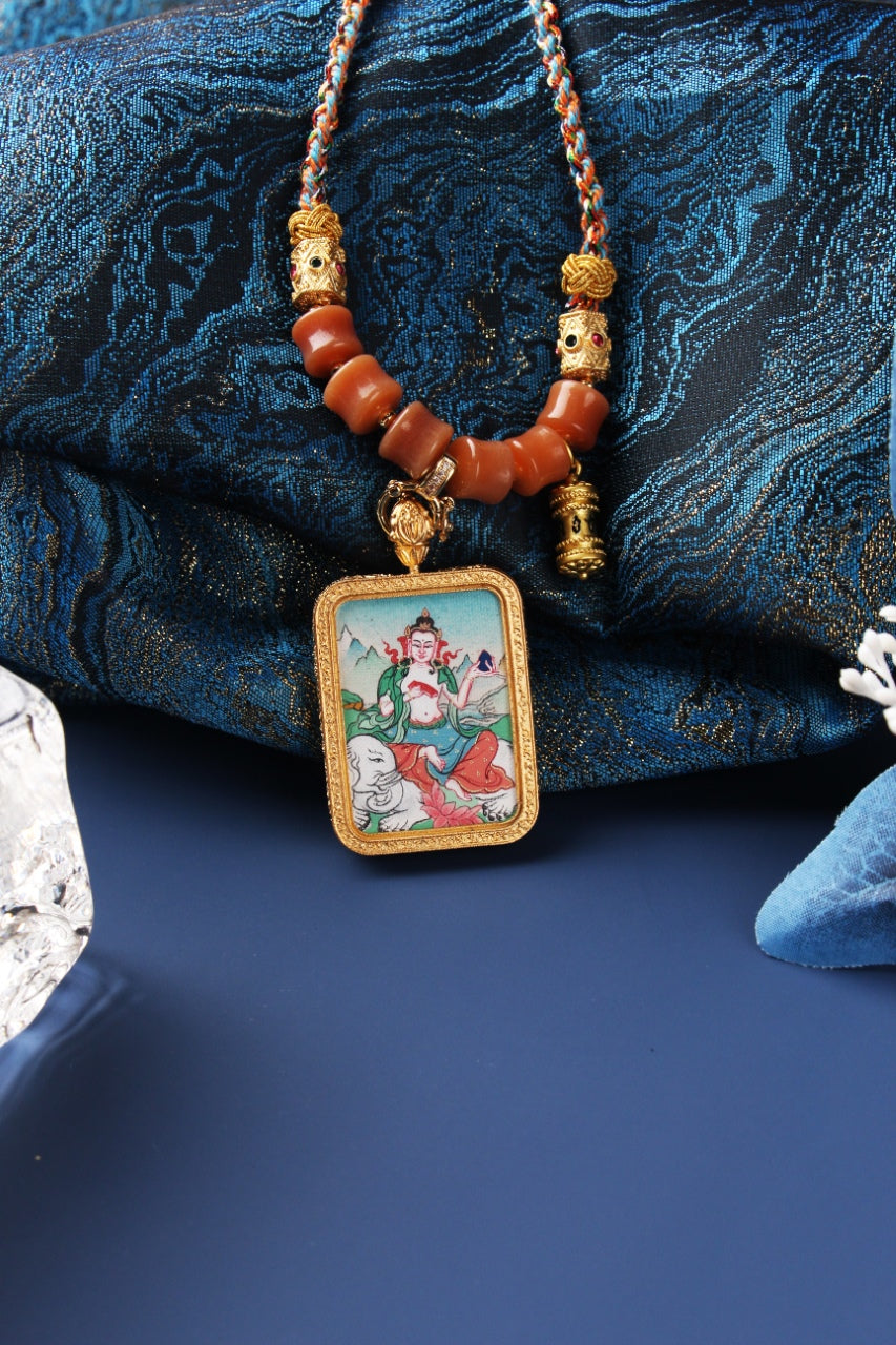  A 4x5cm hand-painted Karma Kagyu Samantabhadra Bodhisattva Thangka pendant featuring the Bodhisattva of Universal Virtue, encased in titanium steel, representing virtue and merit in Tibetan Buddhist tradition