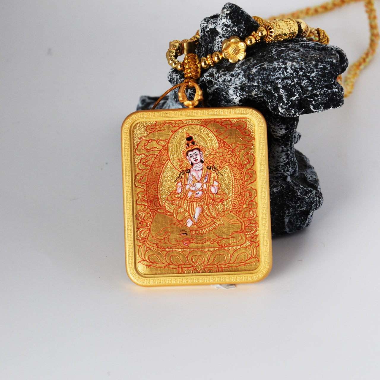 Close-up detail of the Karma Kagyu Samantabhadra Thangka painting showing intricate natural mineral pigment work, showcasing the masterful artistry of Tibetan lineage painters.

