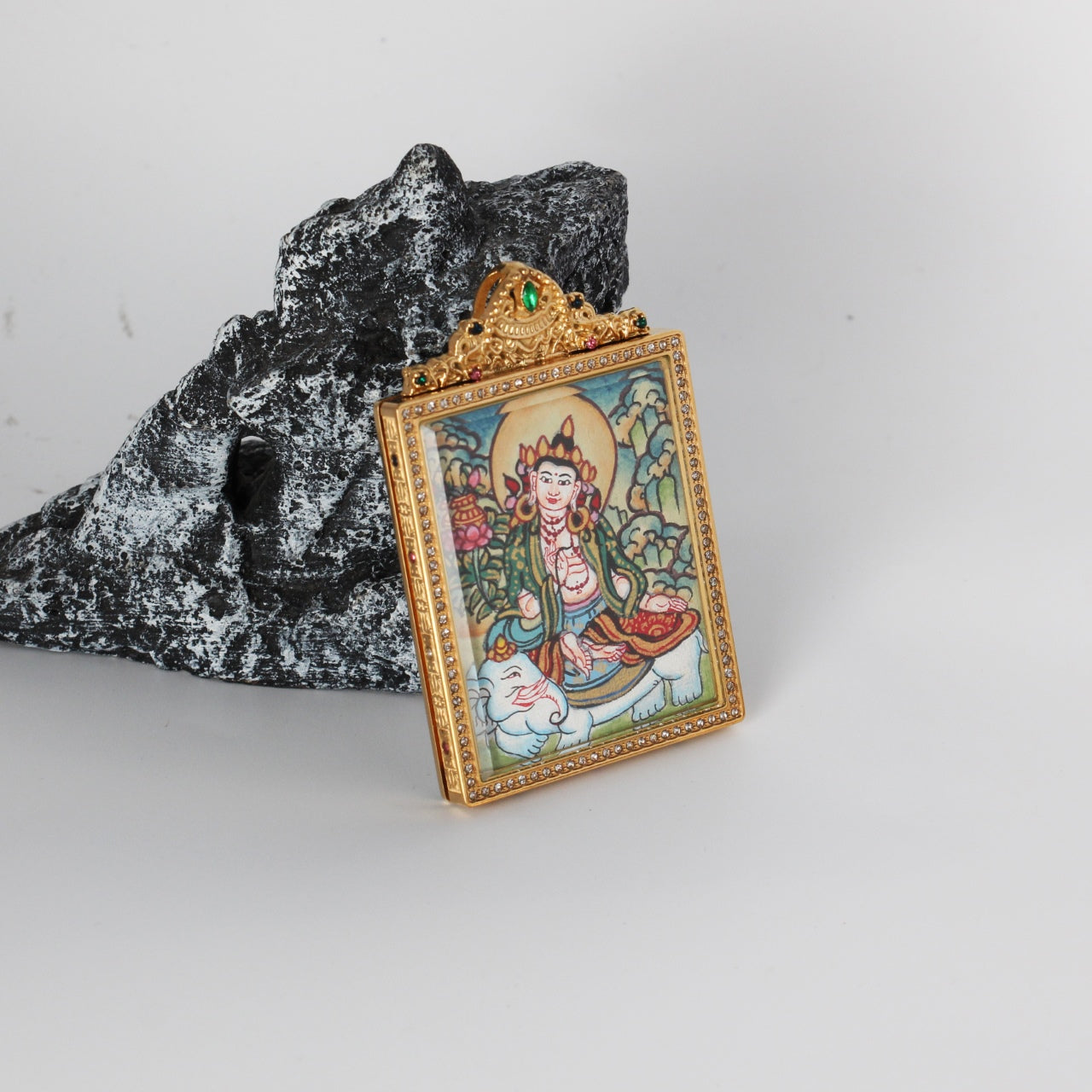 The Nepal Elegant Samantabhadra Thangka pendant displayed as a sacred amulet for virtue and practice, embodying Tibetan Buddhist tradition.

