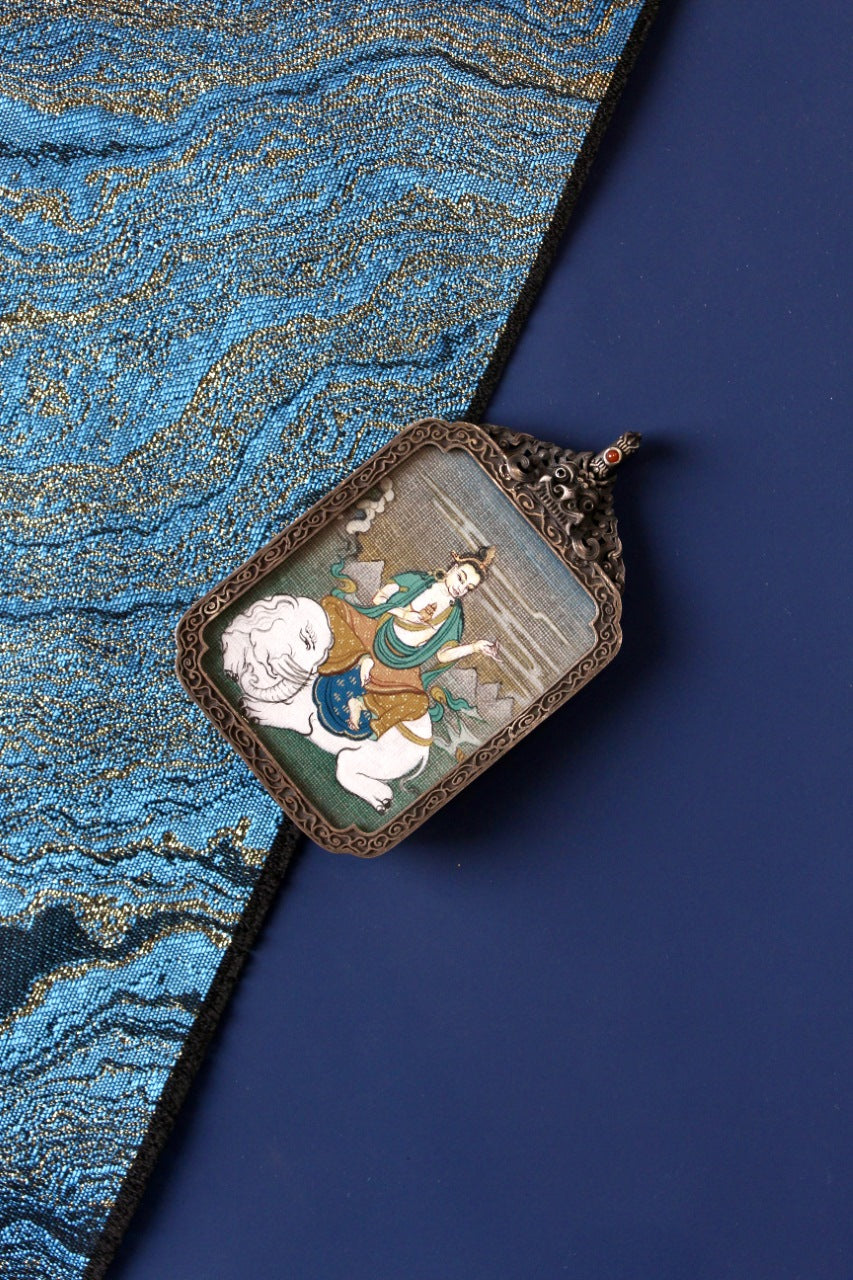 Sacred Tibetan thangka pendant of Samantabhadra Bodhisattva, associated with Himalayan compassion and enlightened activity.