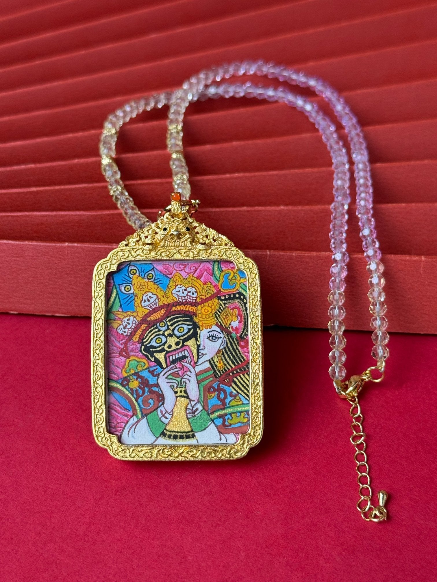  Detailed view of the refined copper casing for the Shachilama Past and Present Thangka pendant, symbolising perseverance and tradition in Buddhist practice.
