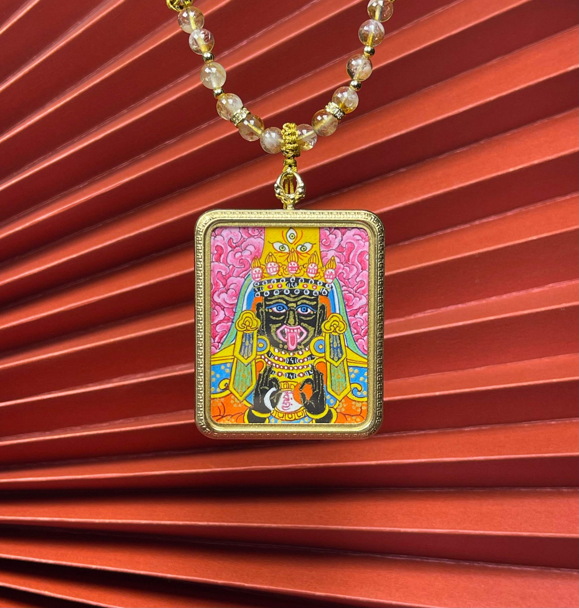Detailed view of the hand-designed cord for the Shachilama Thangka pendant, symbolising wealth and tradition in Buddhist practice.
