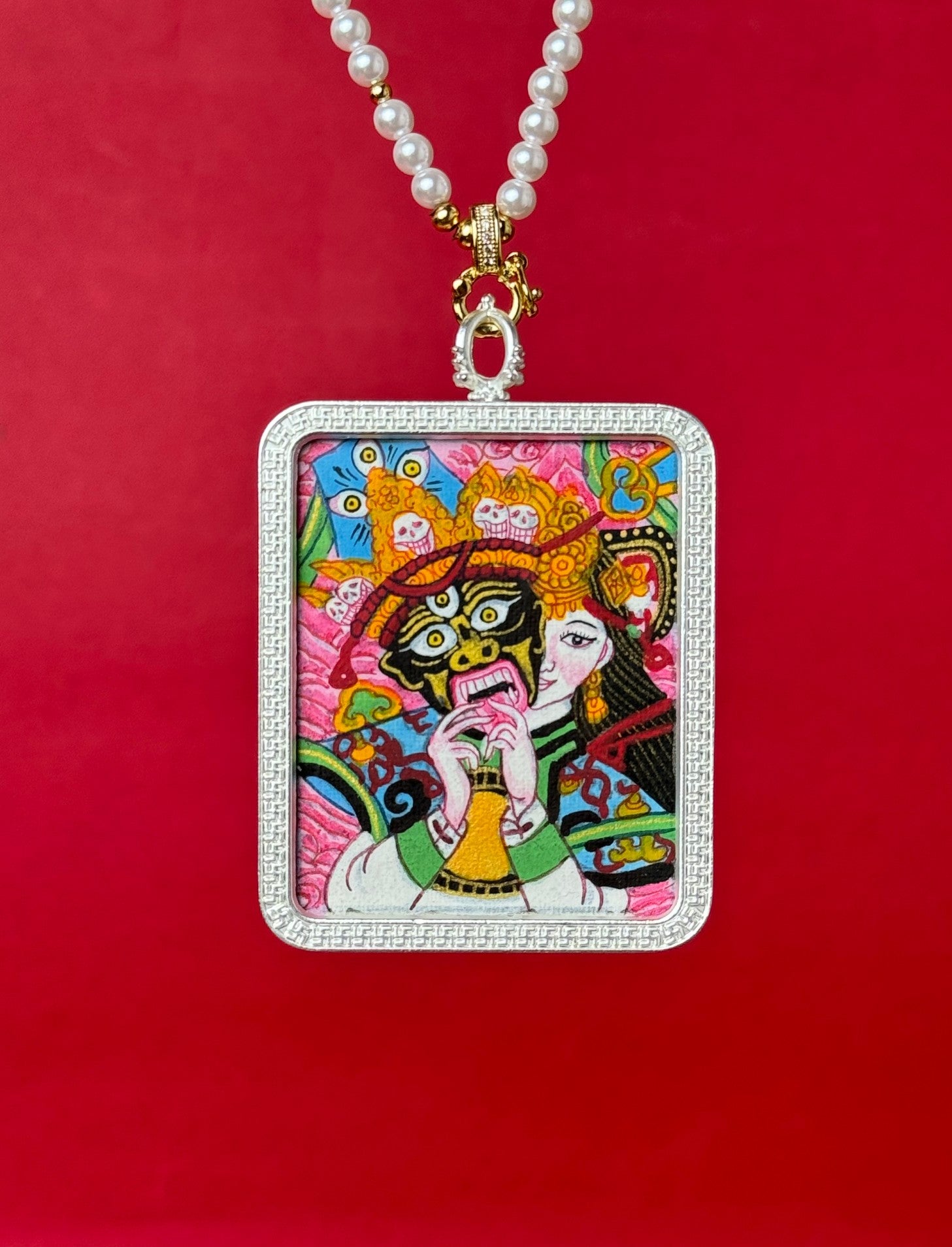 Detailed view of the hand-designed cord for the Shachilama Past and Present Thangka pendant, symbolising wealth and tradition in Buddhist practice.
