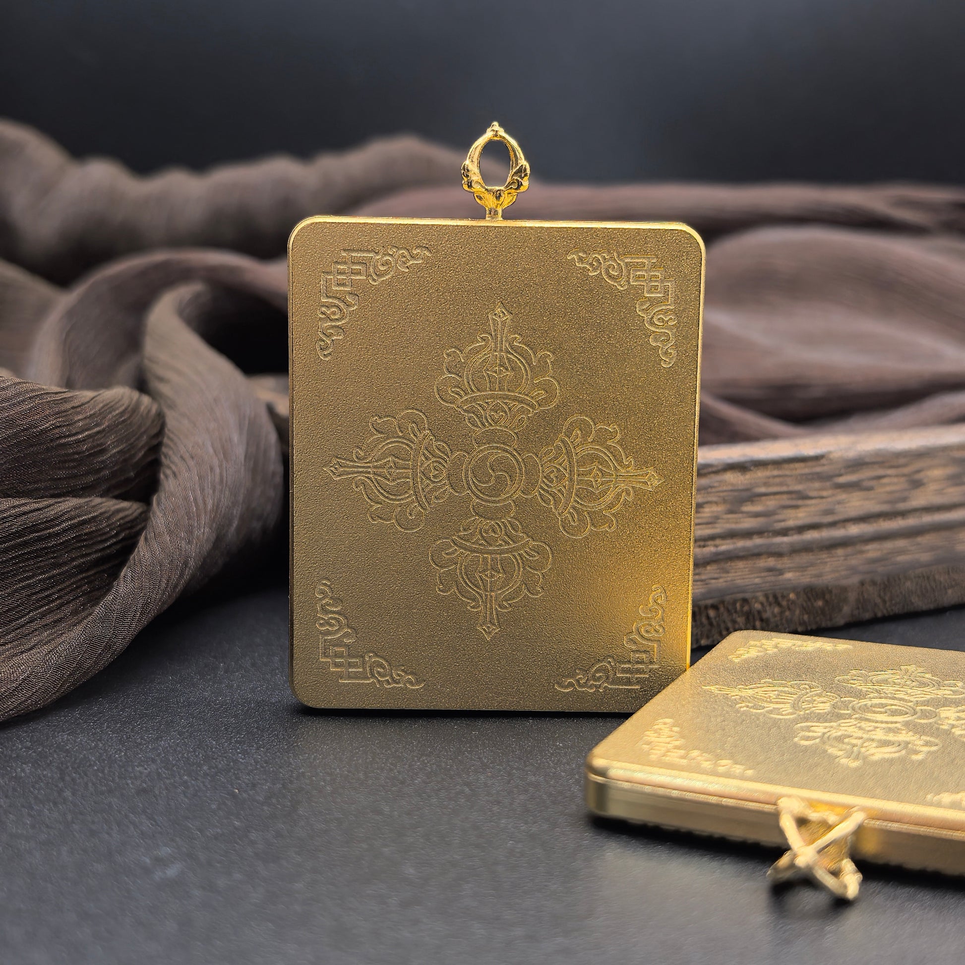  The Nepal Shachilama Pink Past and Present Thangka pendant with titanium casing displayed as a sacred amulet for unyielding courage and harvest and fortune, embodying Buddhist tradition.
