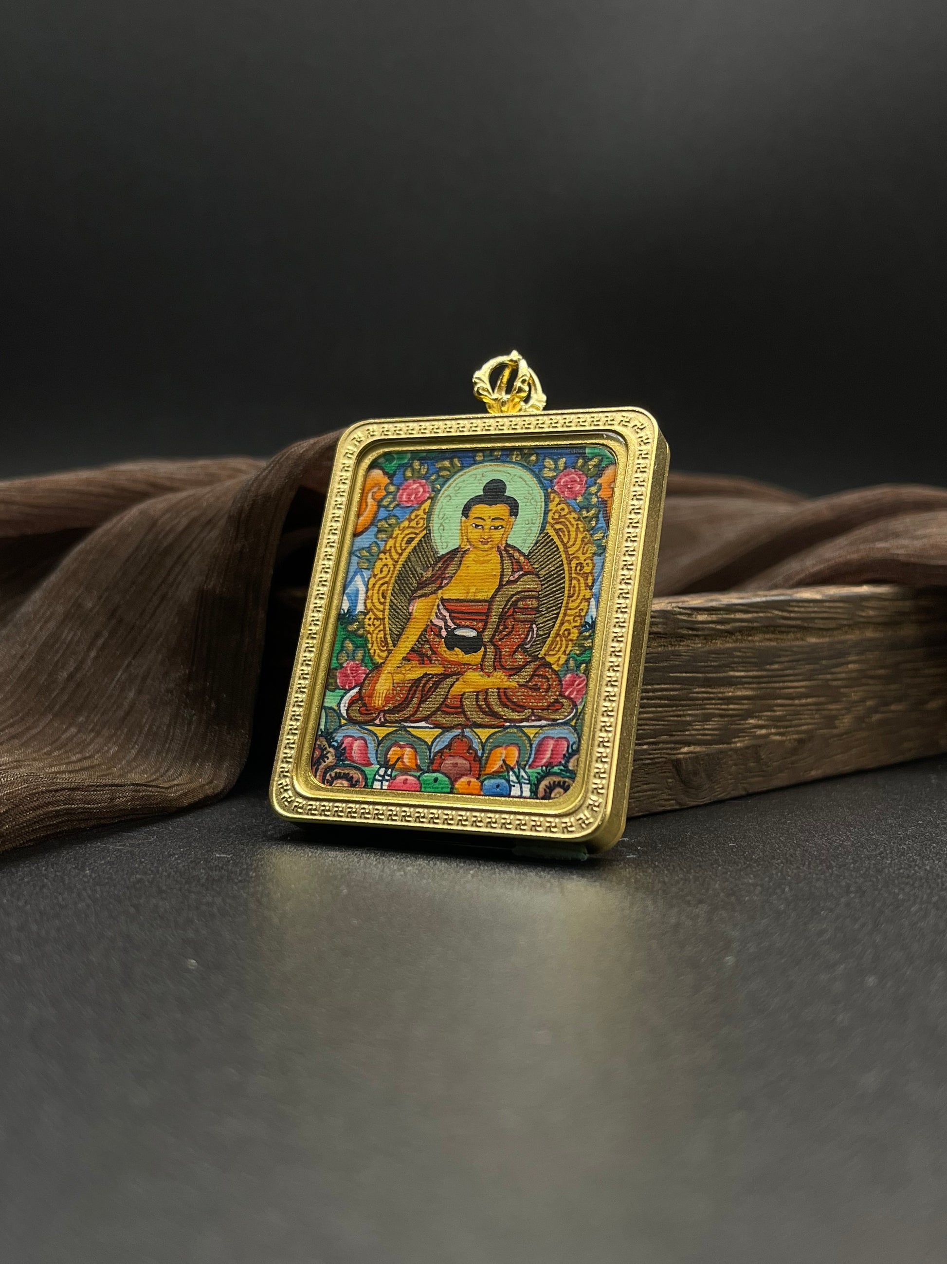  Close-up detail of the Nepal Shakyamuni Buddha Thangka showing hand-painted mineral pigments, showcasing the masterful artistry.

