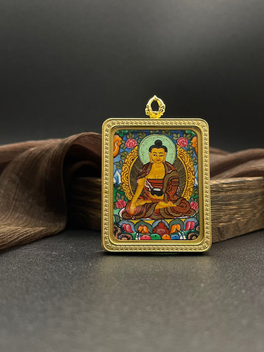 Detailed view of the titanium casing for the Shakyamuni Buddha Thangka pendant, symbolising compassion and tradition in Buddhist practice.