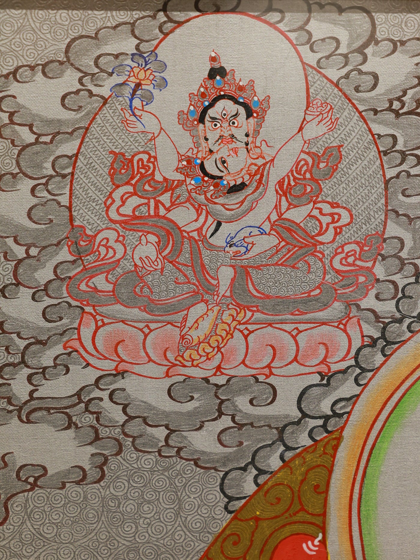 Tibetan Buddhist silver thangka of Yellow Jambhala, revered for wealth blessings and financial stability