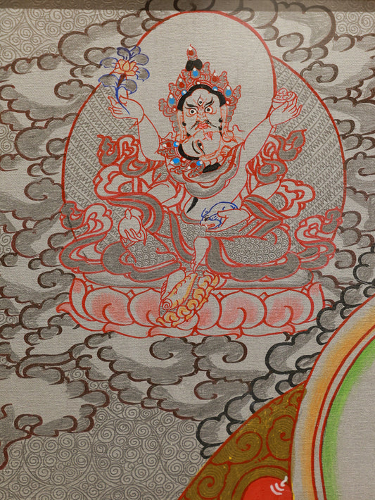 Tibetan Buddhist silver thangka of Yellow Jambhala, revered for wealth blessings and financial stability
