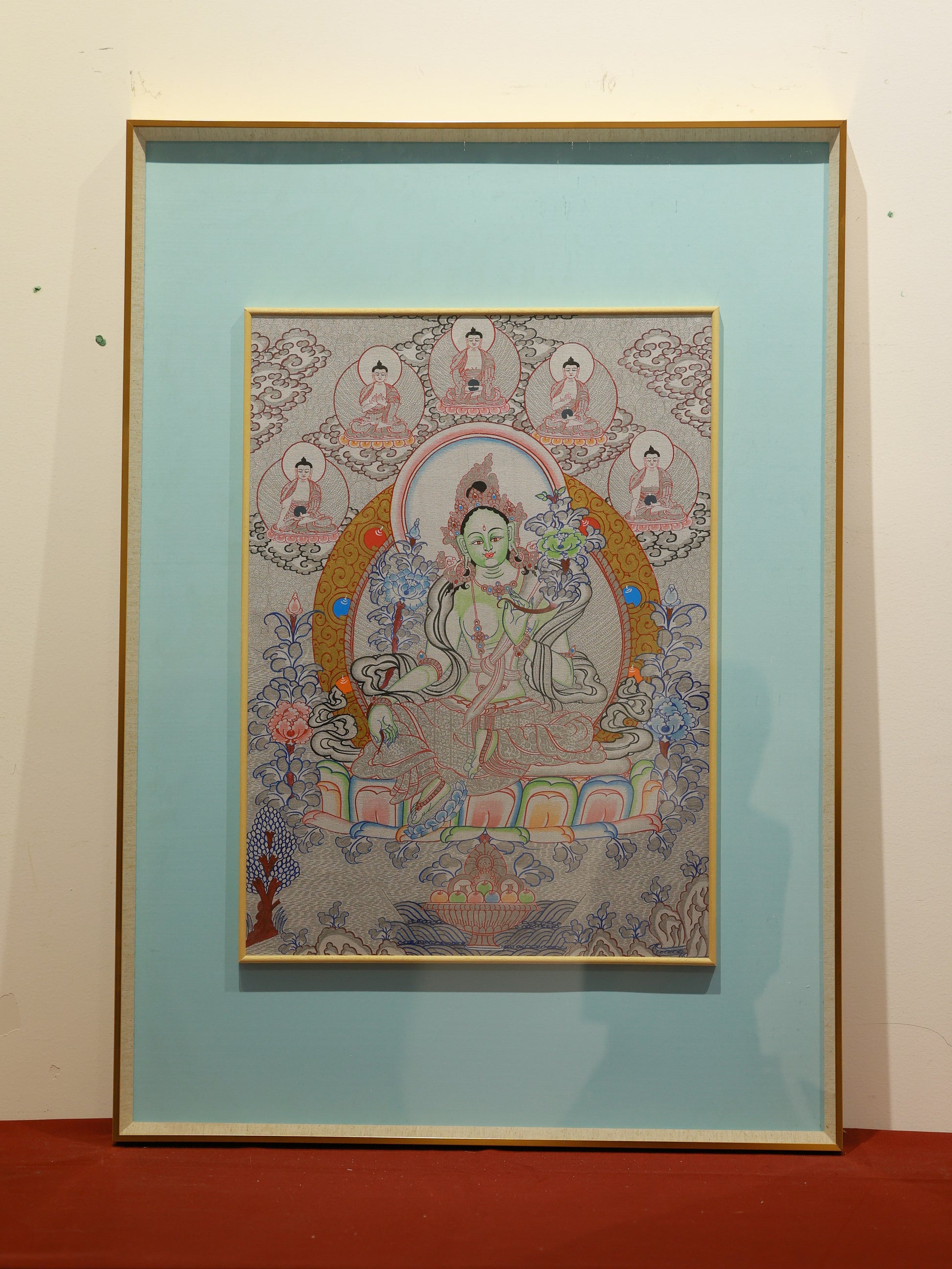 Silver thangka Green Tara bodhisattva artwork symbolizing wisdom and compassionate action