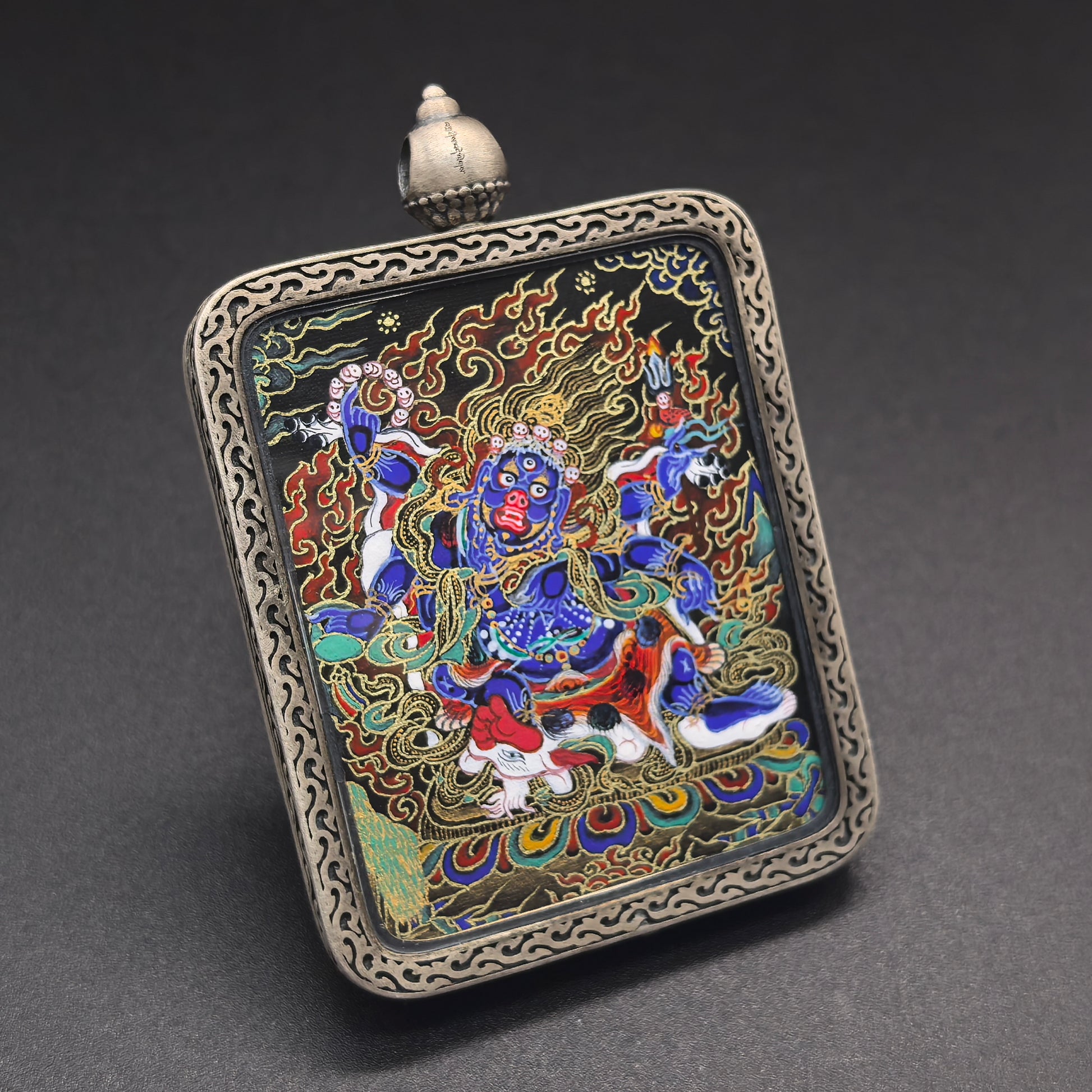 A 4x5cm hand-painted Rekong Six-Armed Mahakala (六臂玛哈嘎拉大黑天) Thangka pendant featuring the great protector, representing protection and fortune in Buddhist tradition.

