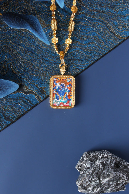 Close-up detail of the Tibetan Buddhist Six-Armed Mahakala Thangka painting showing intricate natural mineral pigment work and wrathful expression, showcasing the masterful artistry of Tibetan lineage painters.

