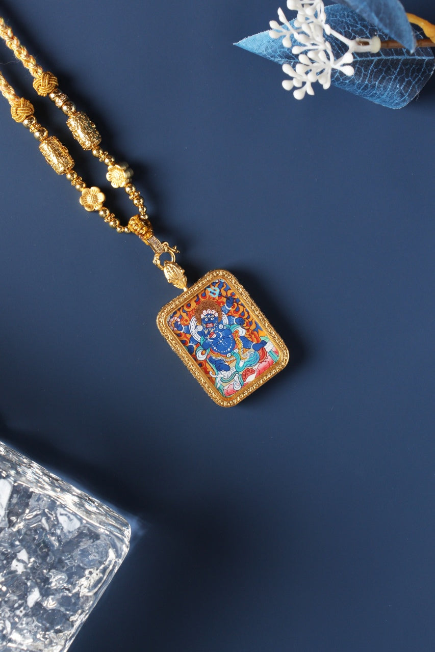 Detailed view of the exclusive 925 Sterling Silver casing for the Six-Armed Mahakala Thangka pendant, symbolizing protection and elegance in Tibetan Buddhist tradition.
