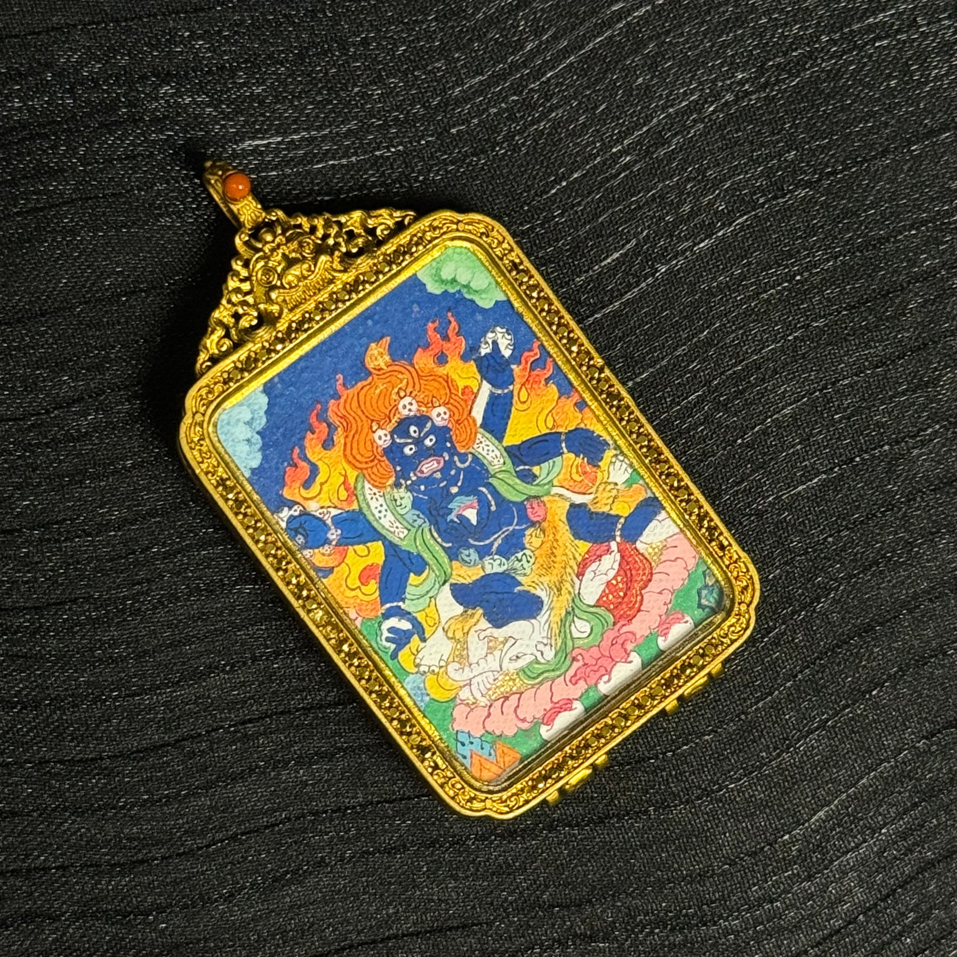  The Tibet Six-Armed Mahakala Thangka pendant displayed as a sacred amulet for protection and fortune, embodying Buddhist tradition.
