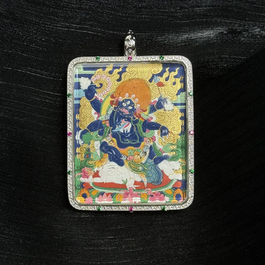 A 4x5cm hand-painted Tibet Bold Six-Armed Mahakala (Great Black One) Thangka pendant featuring the great protector and god of enterprise, encased in 925 silver, dual-face capable, representing pacification and increase in Tibetan Buddhist tradition.
